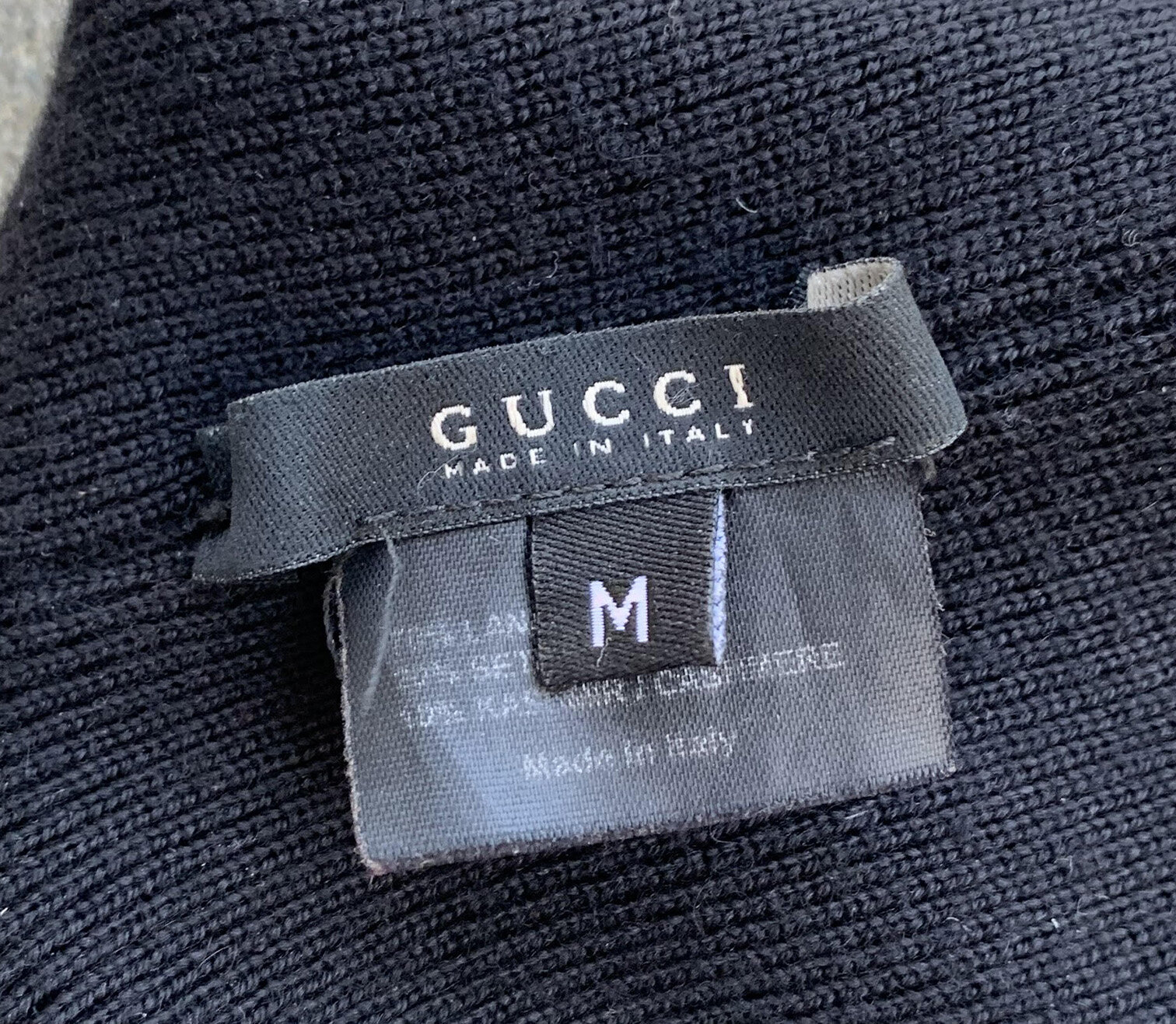 gucci black tag