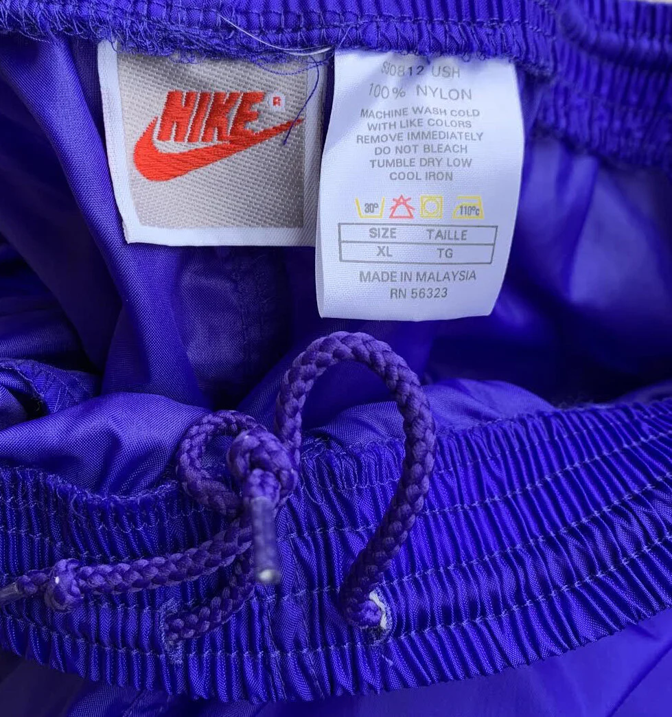 nike grey tag .jpg