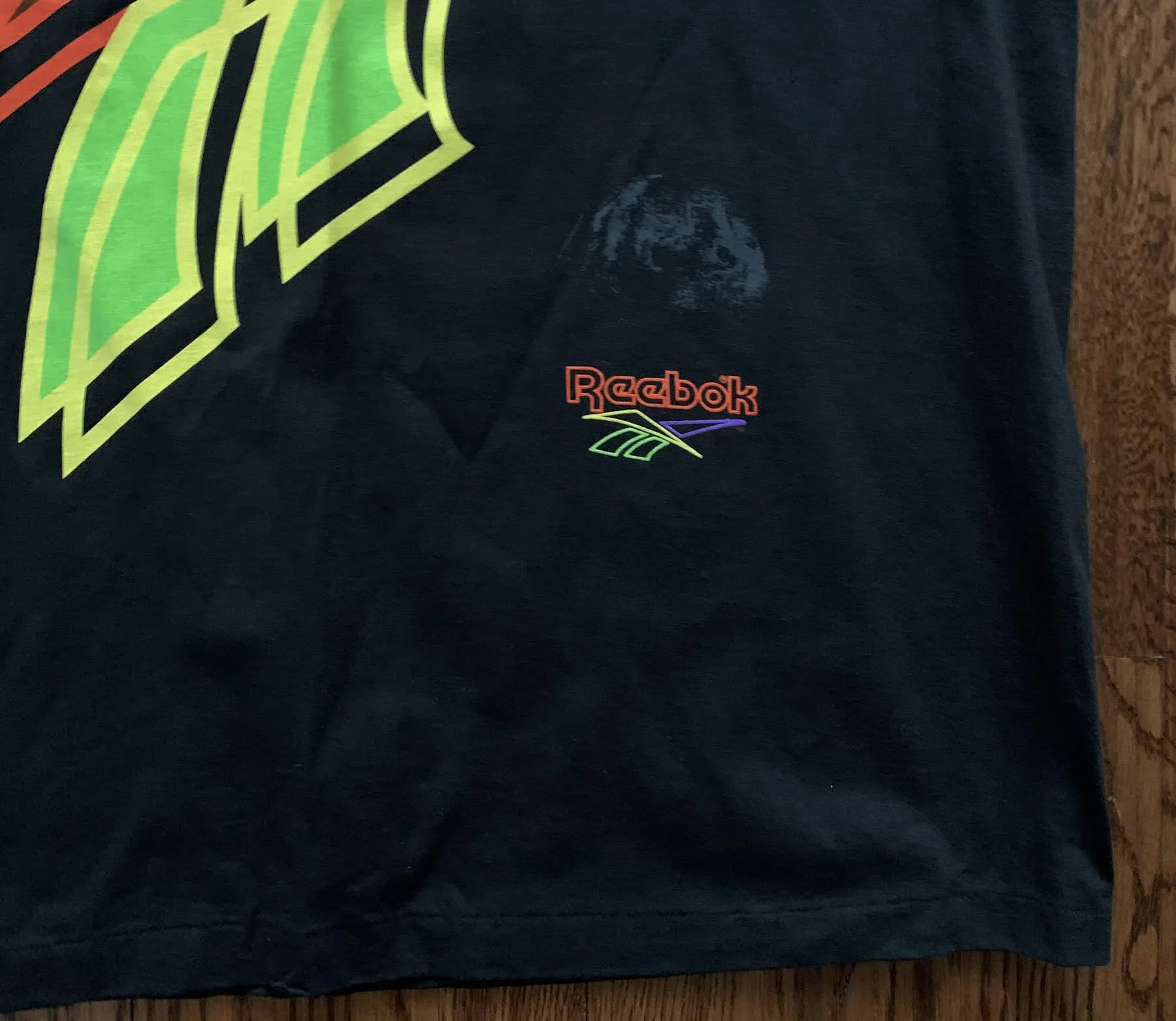 Vintage 90s Reebok Colorful Logo T Shirt. 