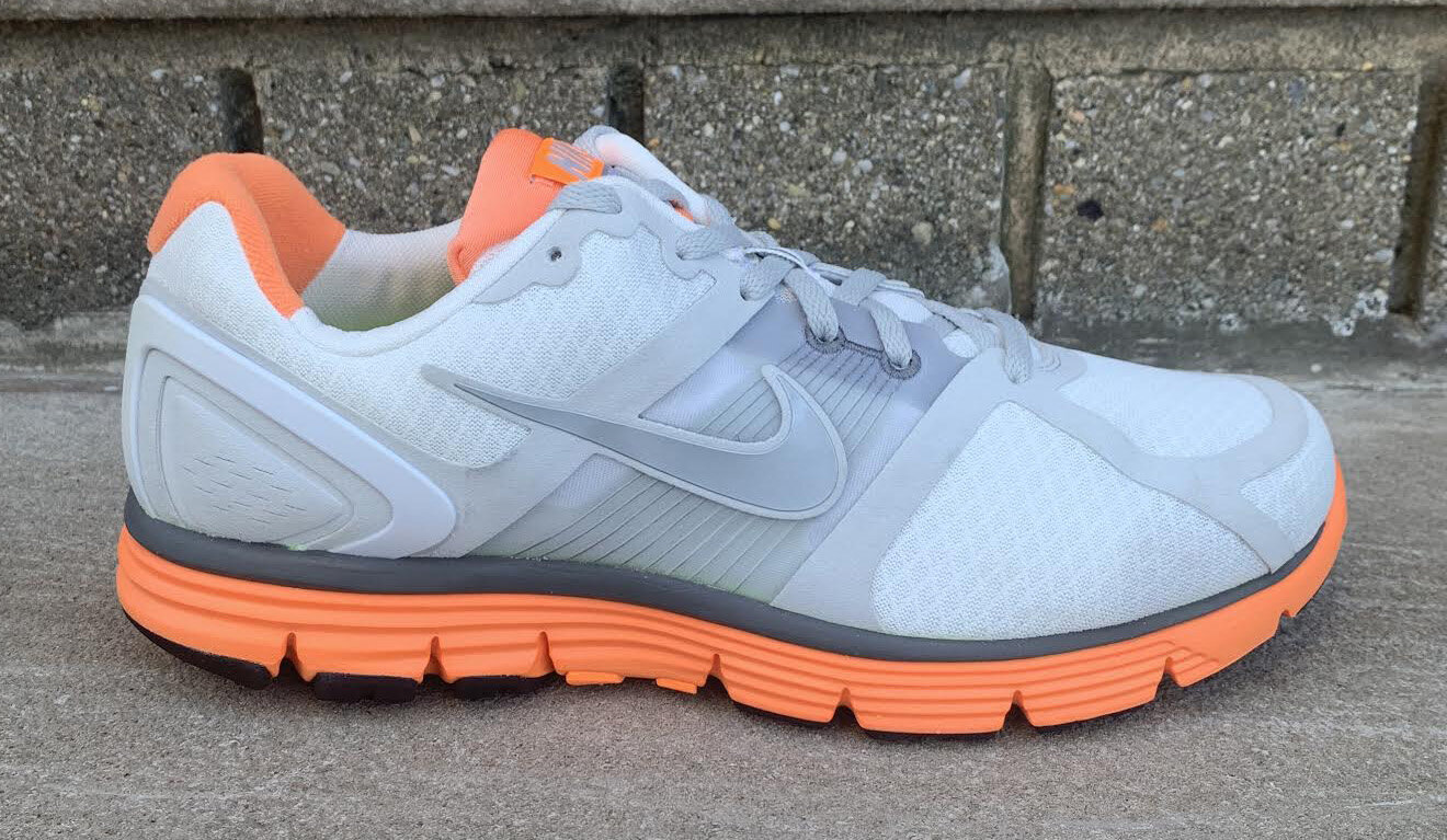 Women’s Nike Lunarglide Metallic Silver and Orange. (Copy)