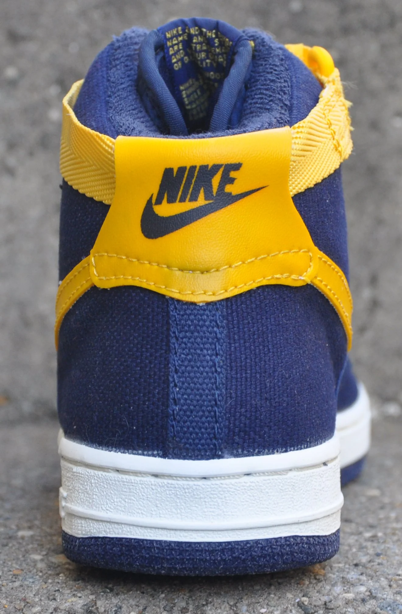 navy blue and yellow high top air force ones
