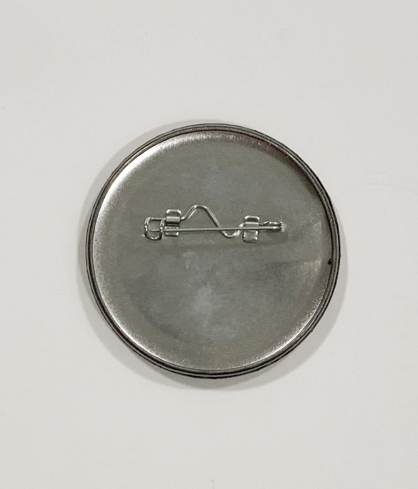 back of aaliayh pin .jpg