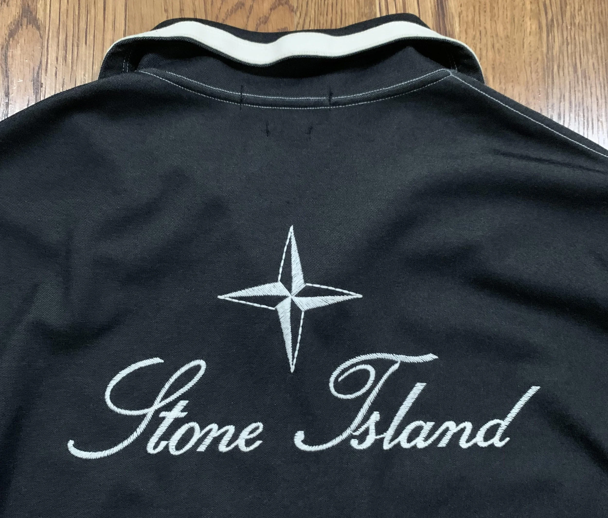 Stone island spell out on back .jpg