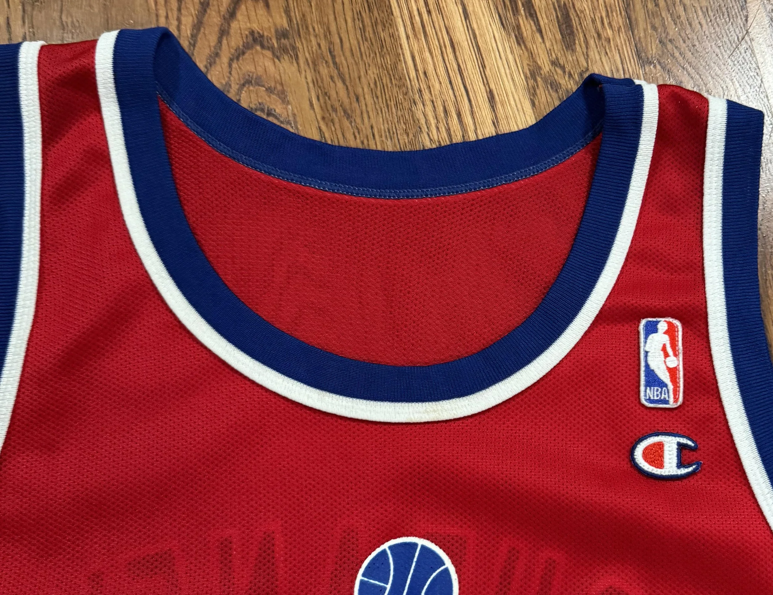Champion and NBA logo.jpg