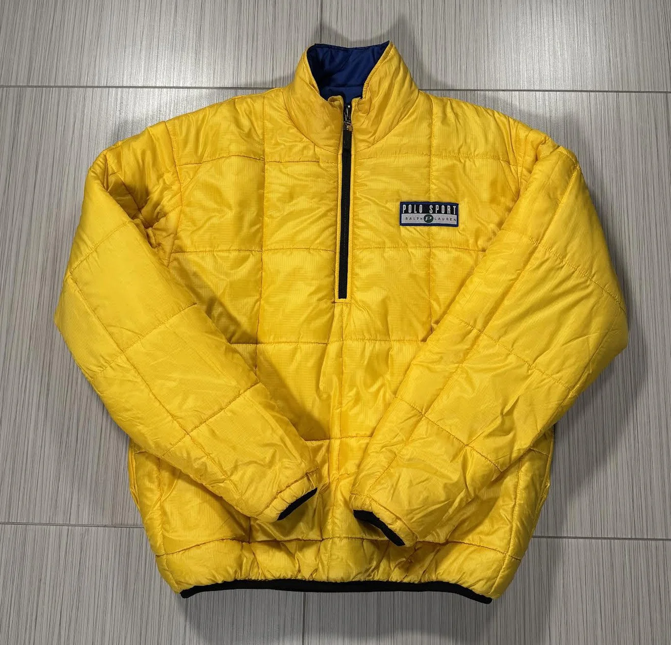 front of polo sport reversible yellow jacket.jpg