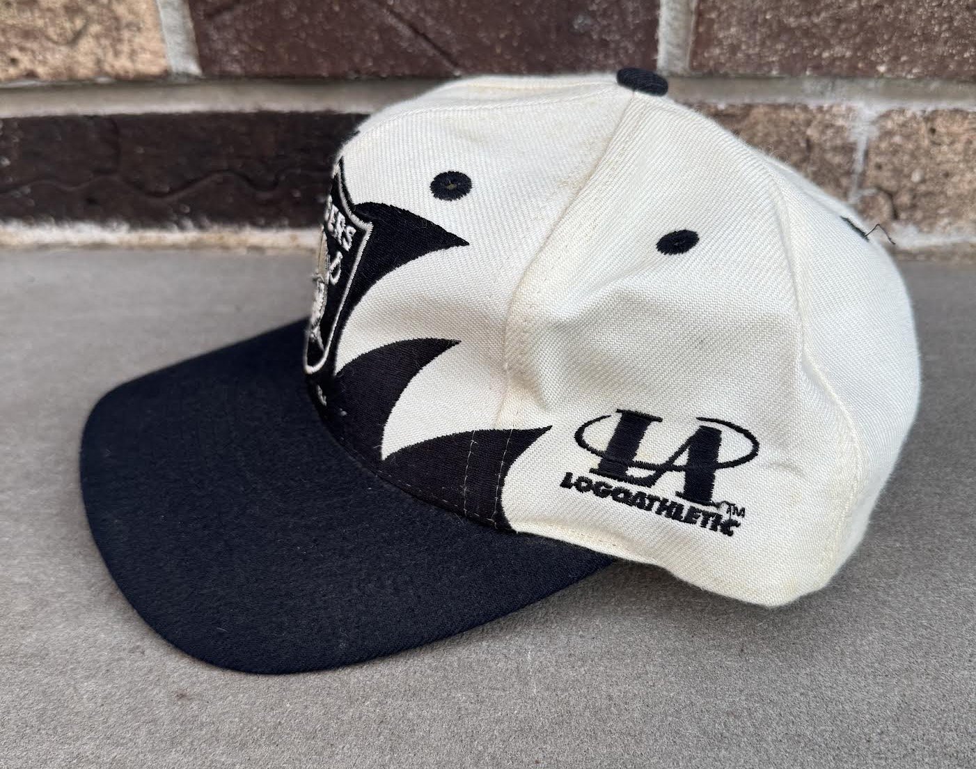 Side of Logo Athletic Raiders Sharktooth Snapback.jpg