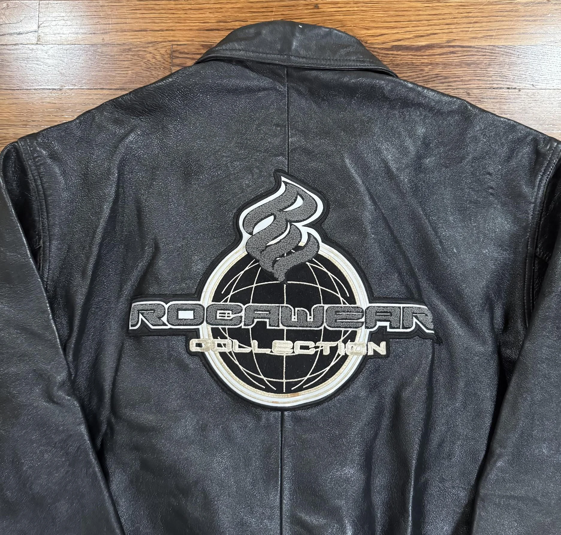 Rocawear logo on back of leather .jpg