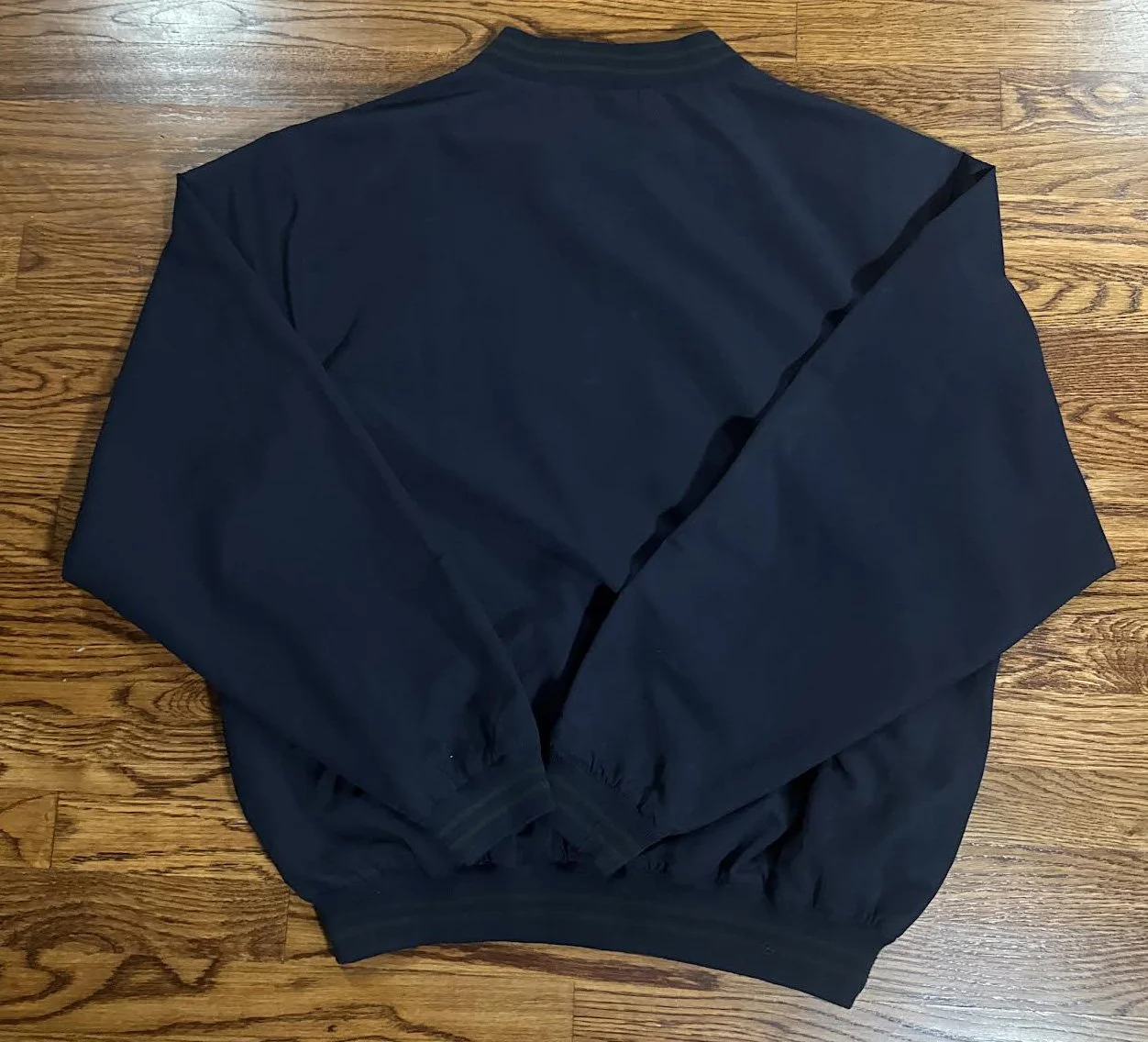 back of Rolex windbreaker navy.jpg