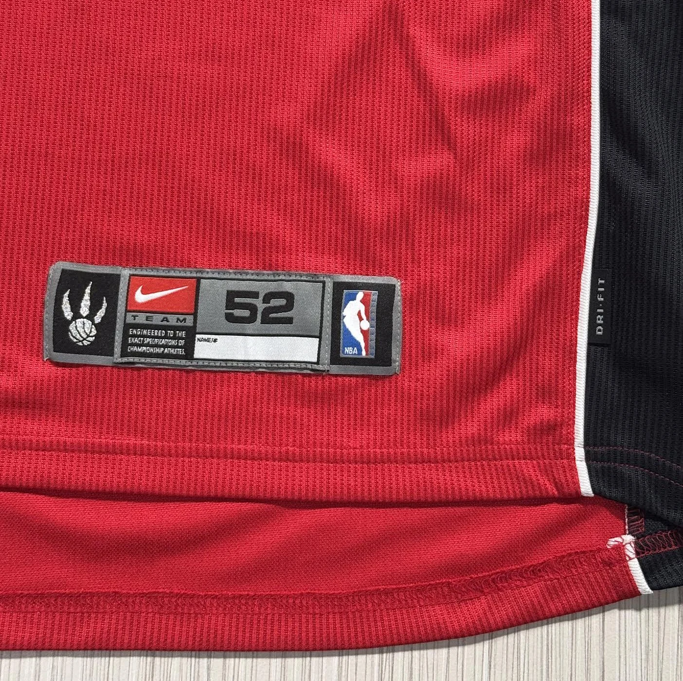Size 52 Raptors Nike Jock tag.jpg