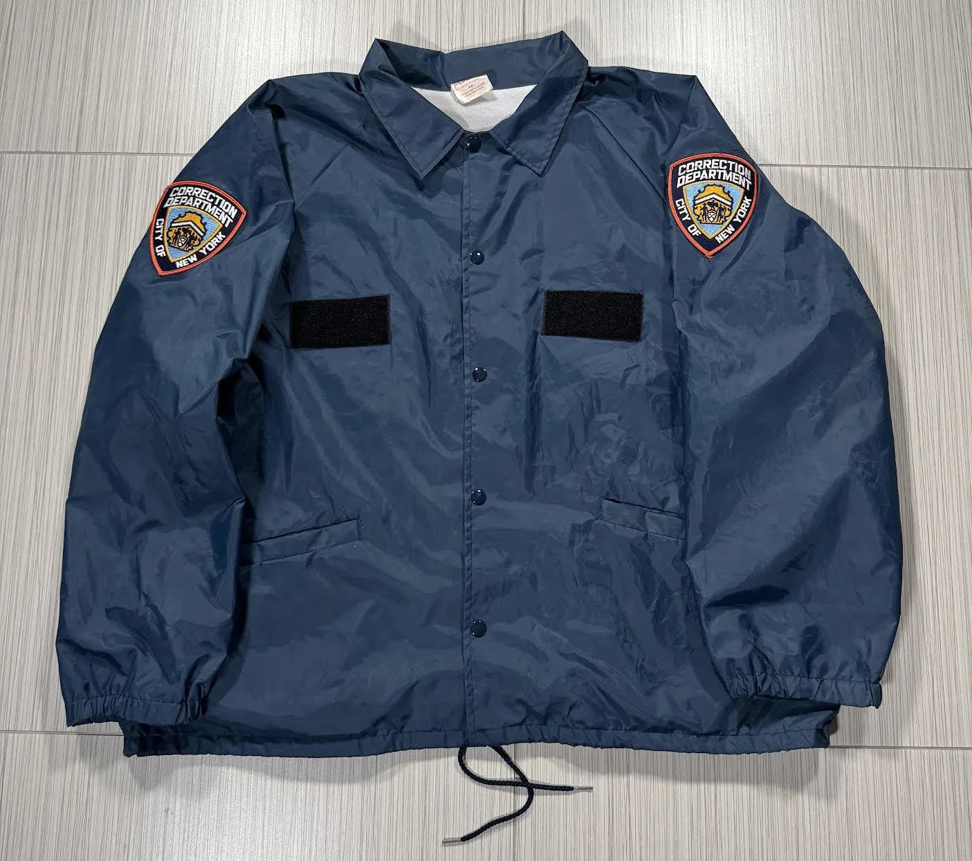 front of NY Corrections windbreaker.jpg