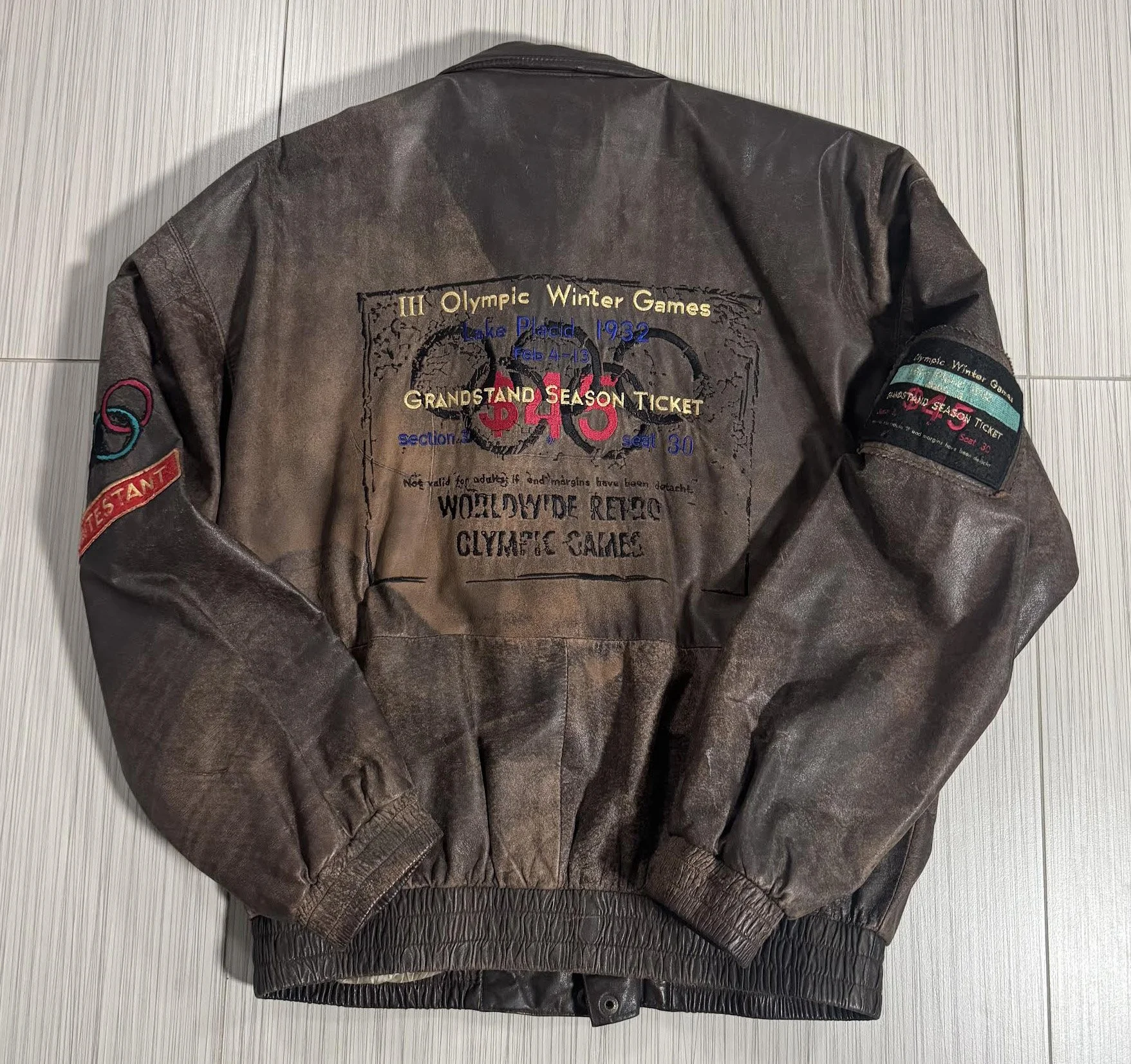 back of Adidas brown jacket.jpg
