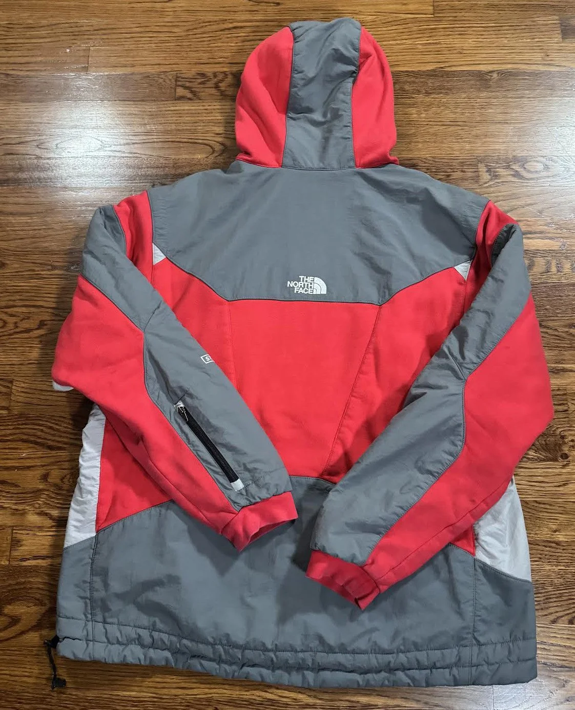back of Steep Tech red grey jacket.jpg