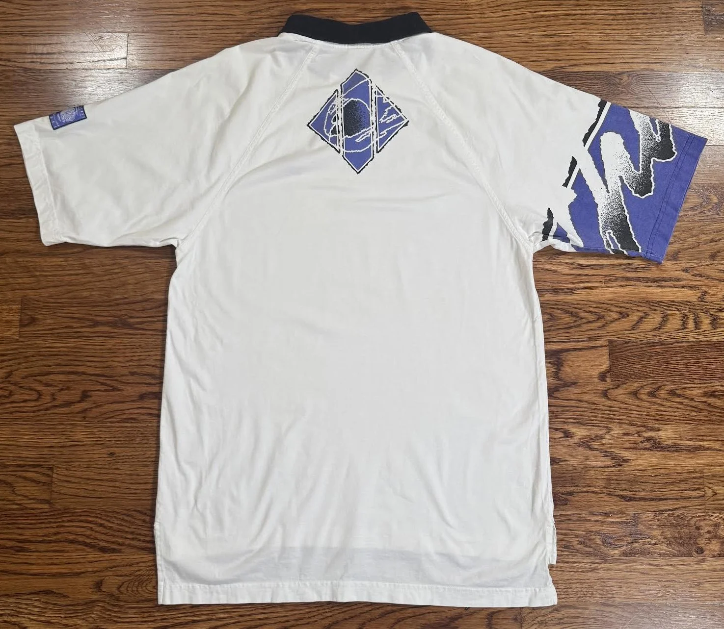 back of Nike Challenge Court Shirt .jpg