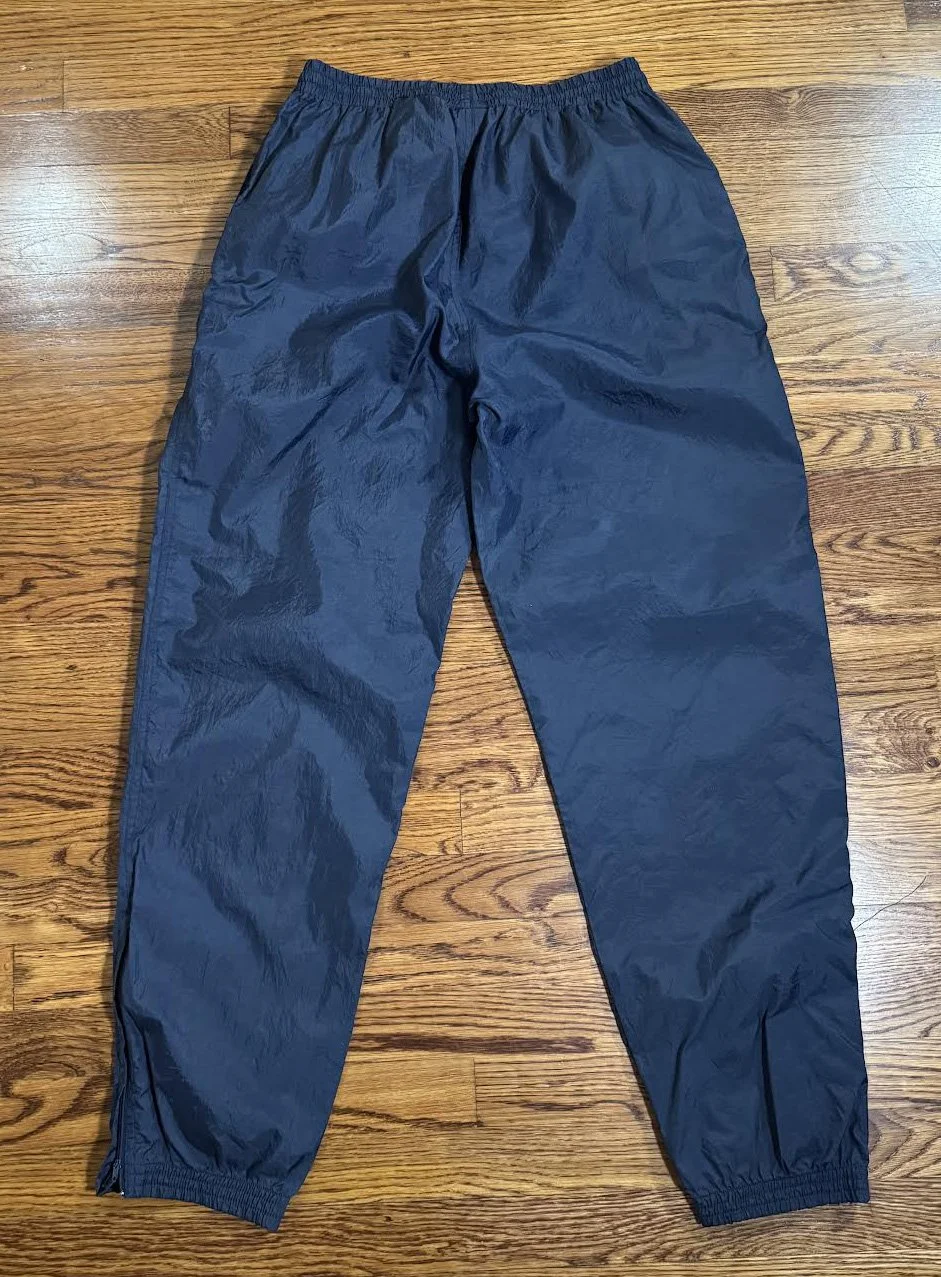 bottom of navy New Balance pants .jpg