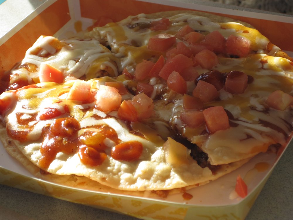 it may not look like much here, but when you have only ever had the option to split regular tacos with your siblings and then one day the baby of the family orders a mexican pizza as if that is okay, trust me you want a mexican pizza.