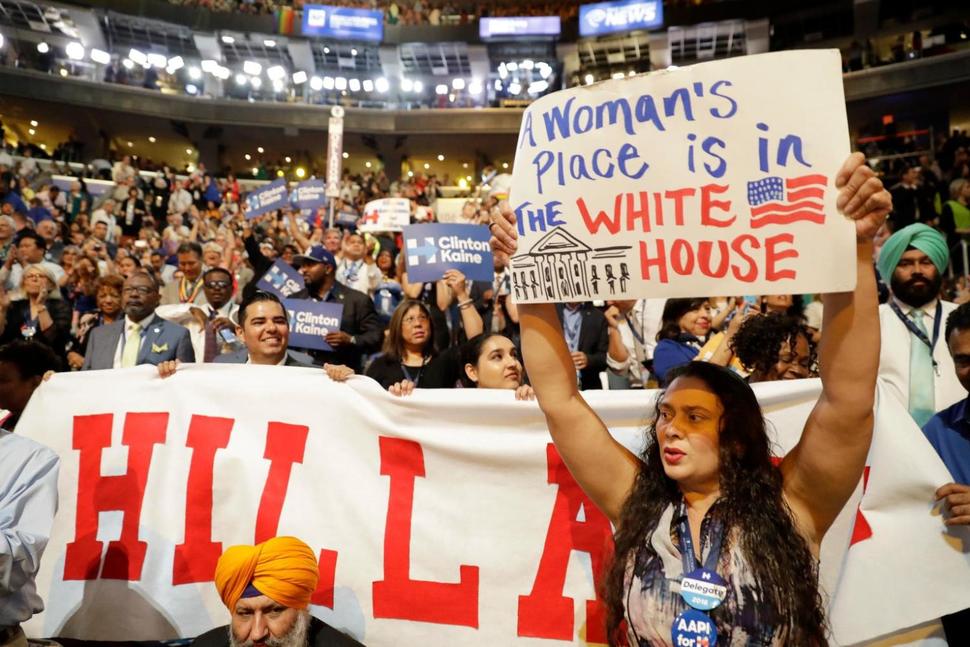 California delegates hold up signs as they cheer for Democratic presidential nominee Hillary Clinton during the final day of the Democratic National Convention in Philadelphia, Thursday, July 28, 2016. (AP Photo/Matt Rourke) THE ASSOCIATED PRESS SOURCE: http://www.usnews.com/news/politics/articles/2016-07-28/ap-explains-long-history-of-women-running-for-president