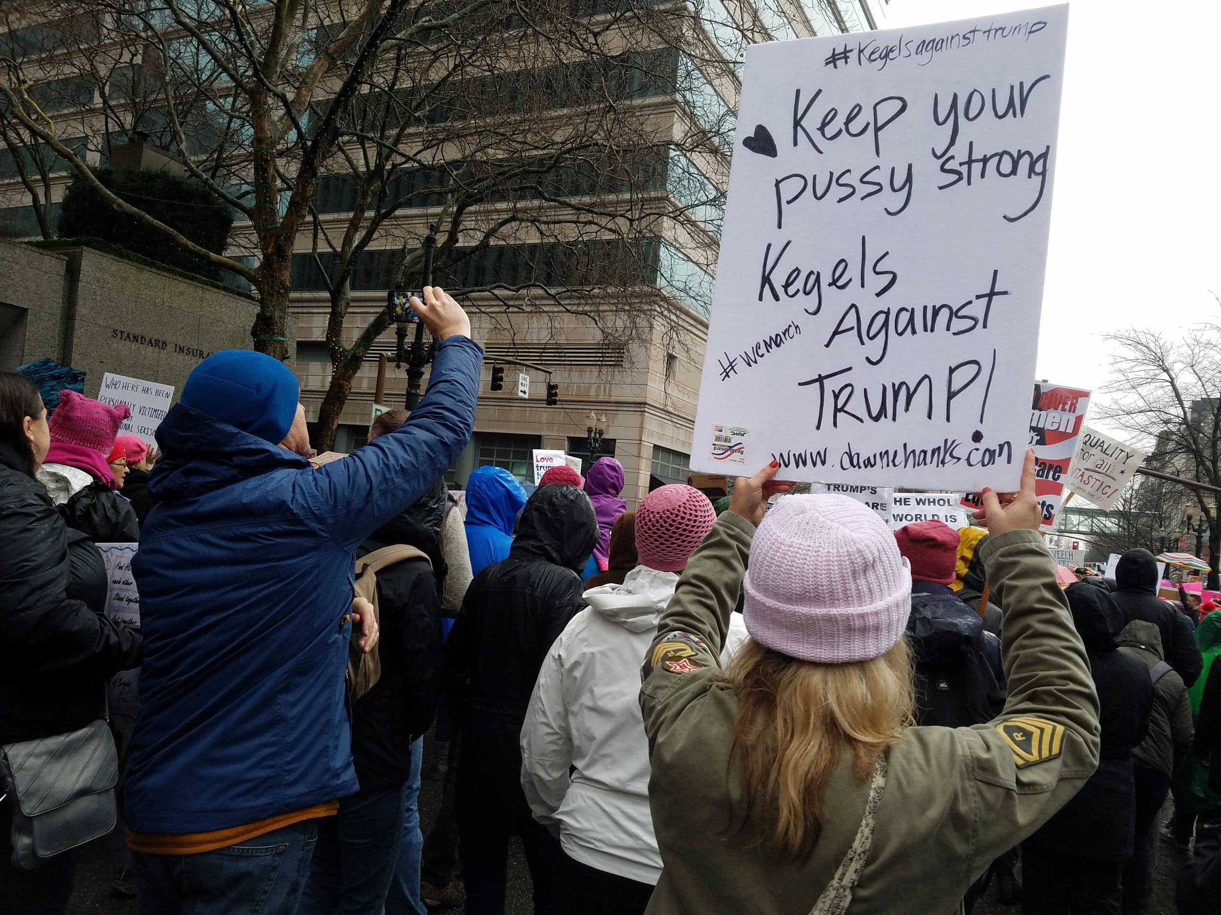 This is my own photo that someone in my group helped to capture. Here I am marching with like minded people. A moment I will forever be proud and humbled by. This is what democracy looks like