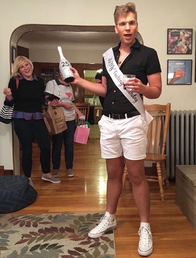 The sash says, “it’s my fucking birthday” in glitter cursive. :)
