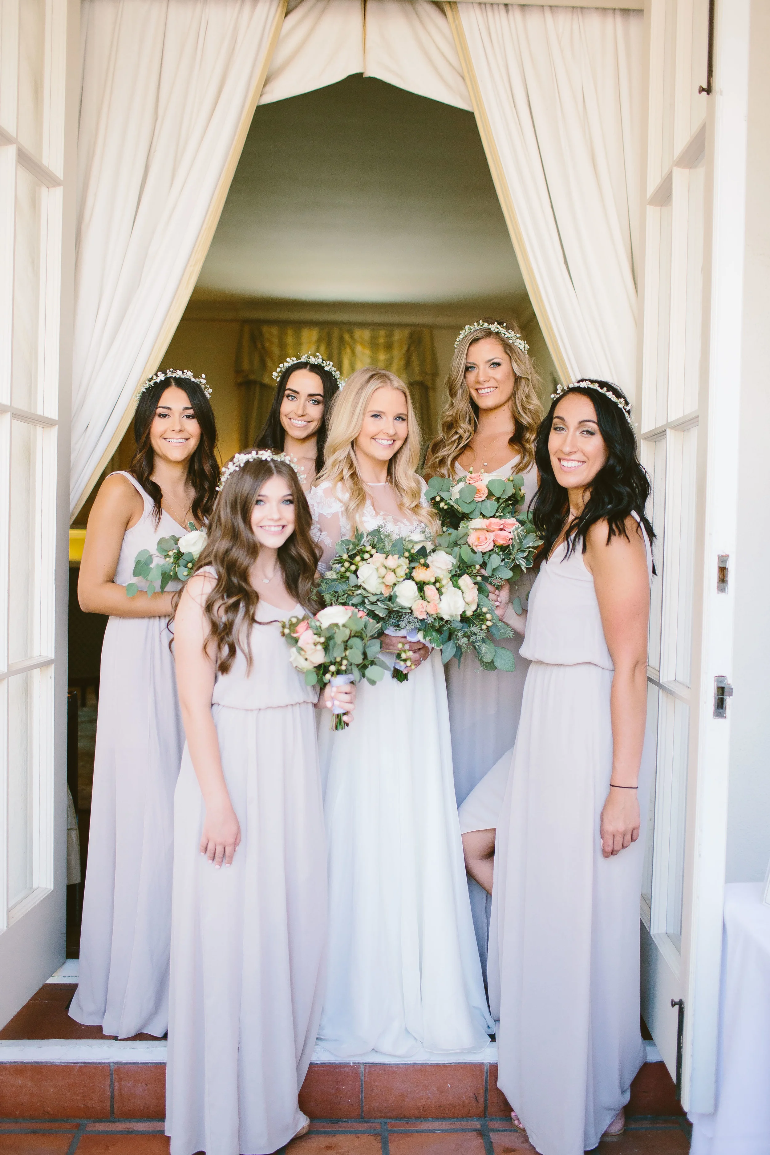 Loving these Show Me Your Mumu bridesmaid dresses and baby's breath flower crowns! 