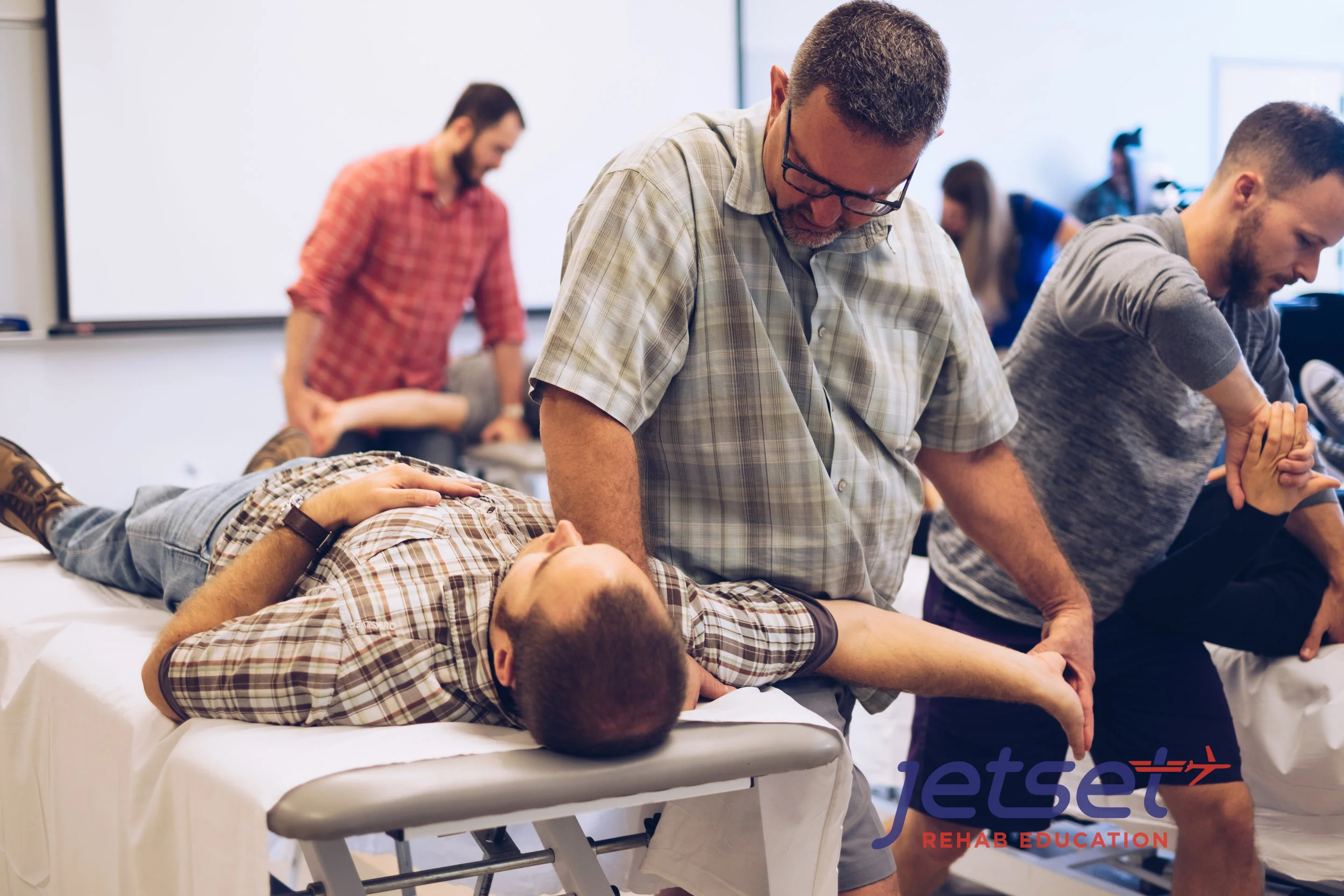 Later in the afternoon, we start the lab portion of the course. In this photo, every detail of the neurodynamic tests were reviewed piece by piece. In Photo - Allen Rubin .