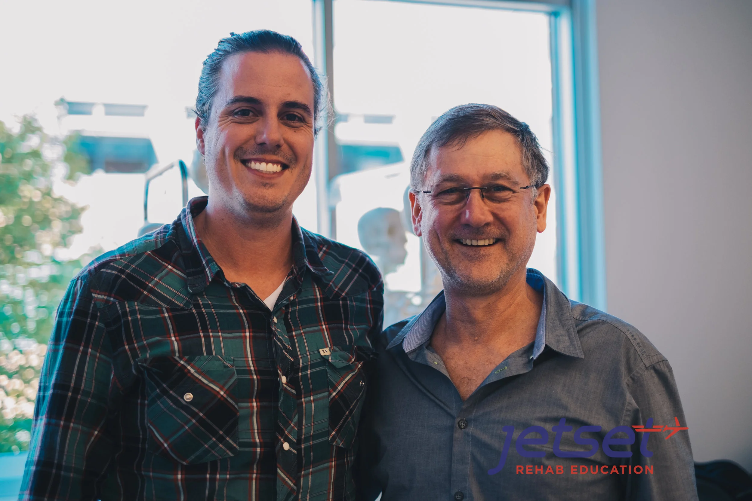 Andre "The Great" Chavez with Michael Shacklock . Andre teaches for Movement Links and helps Jetset Rehab Education organize continuing education courses for Chiropractors, Athletic Trainers and Physical Therapists. He and the Jetset Rehab team collaborated on a case study which was published in JOSPT .