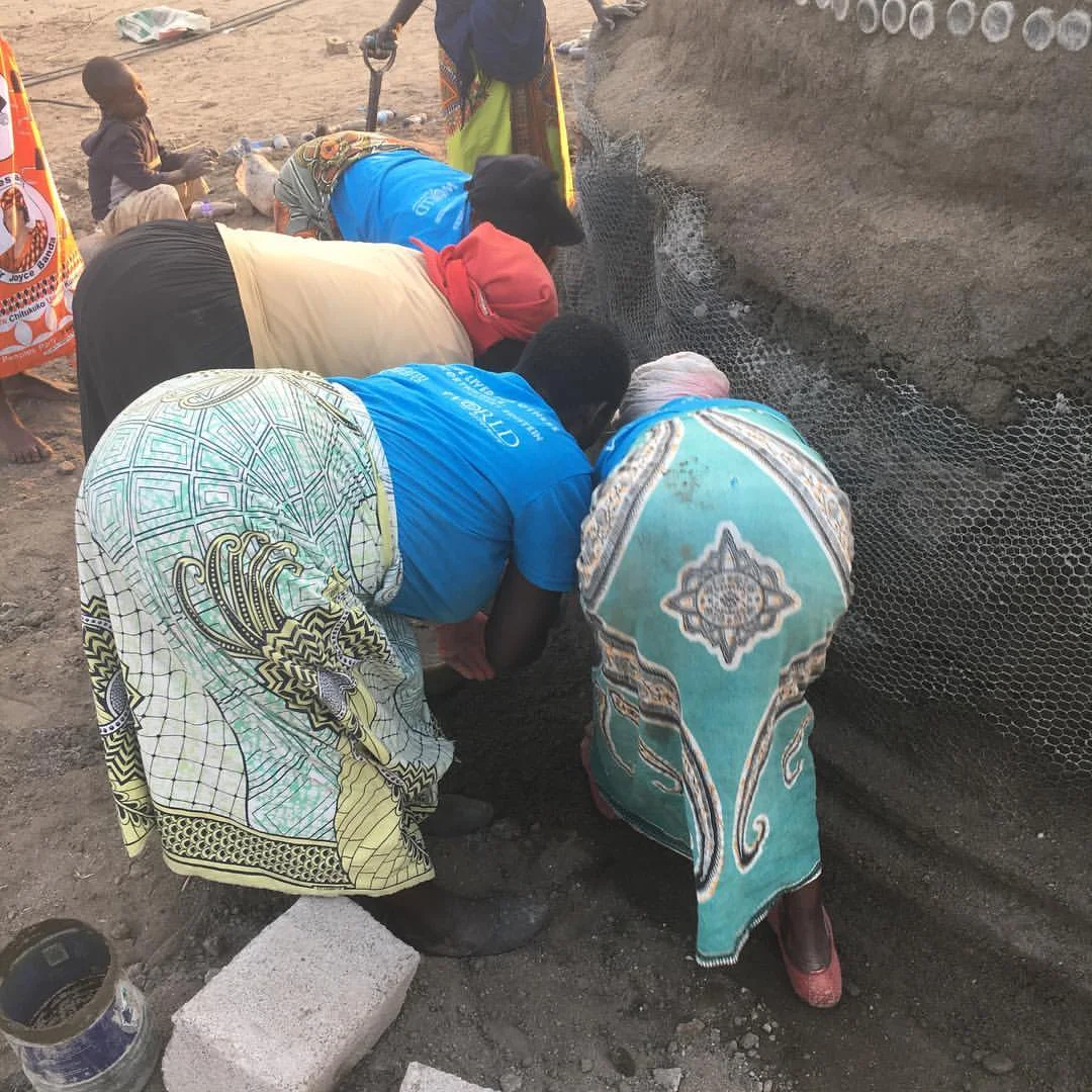 In the podcast we discuss how these African women avoid back injuries yet work in this position all the time! Photo taken by Melanie Carlone.