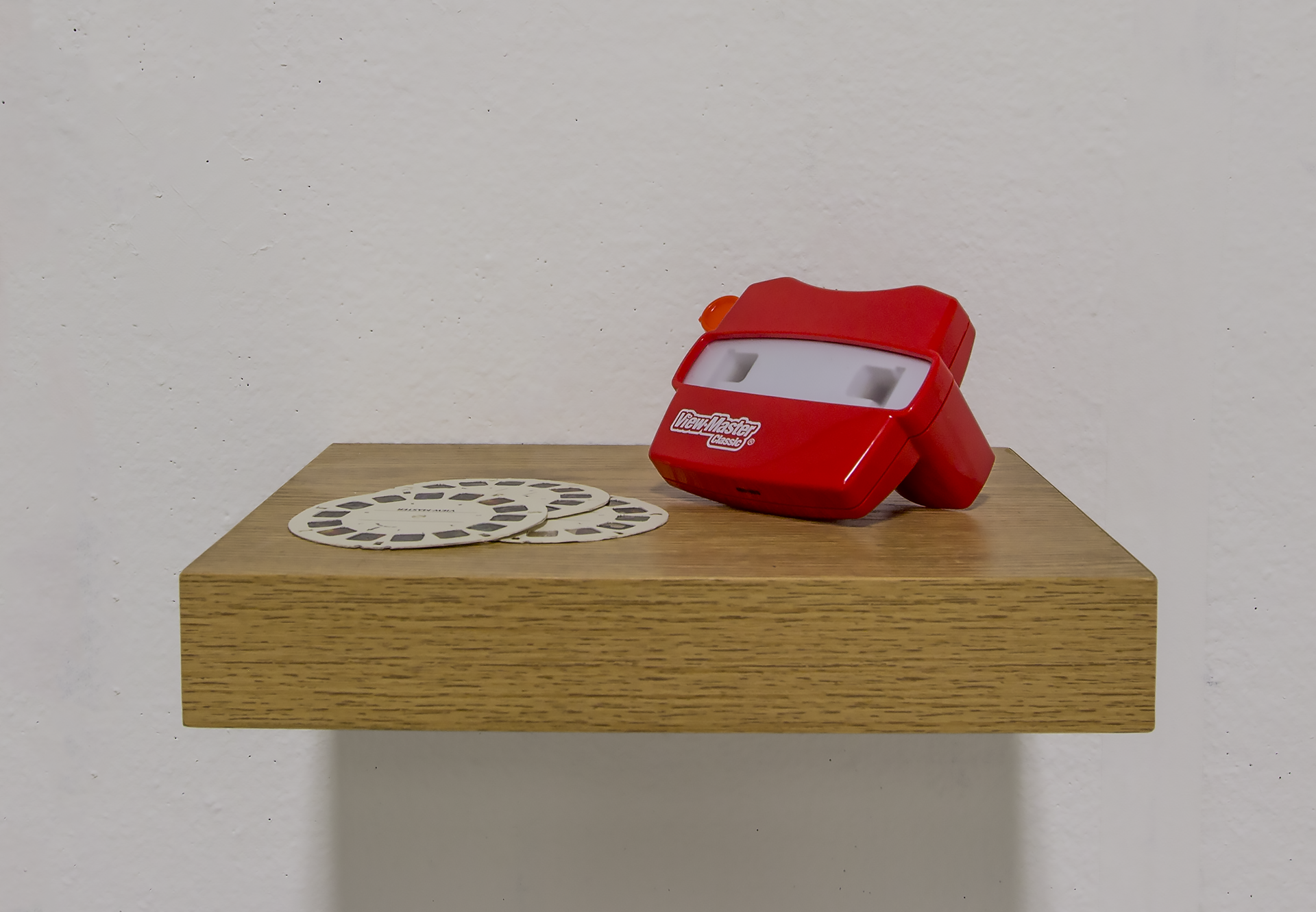That Clicky-Looky Thing View-master, slides, wooden shelf 5” x 12” x 10” 2016