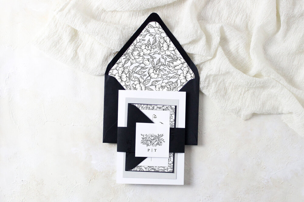 Black and white floral paper cut wedding invitation