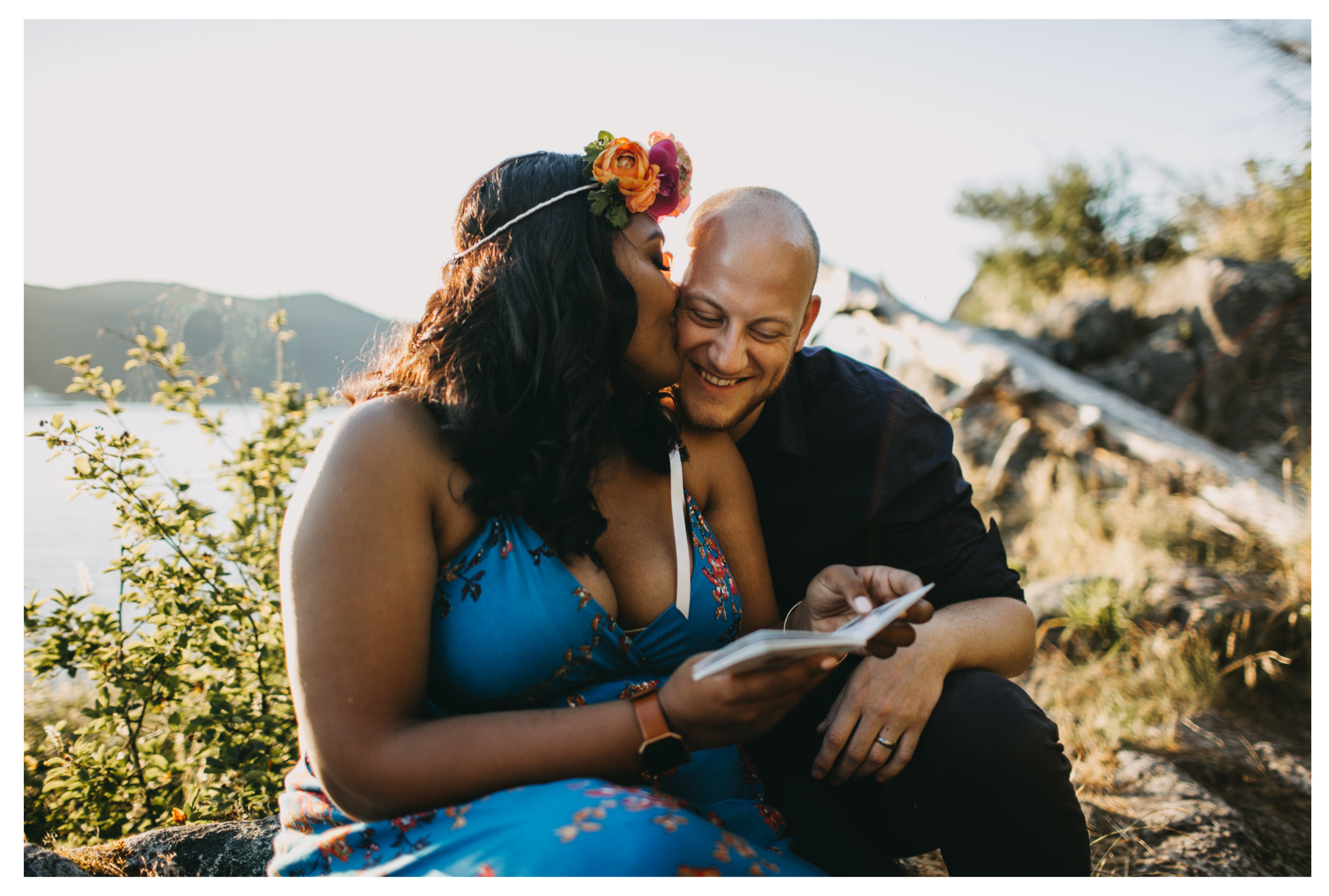 couple kiss candid engagement whytecliff park