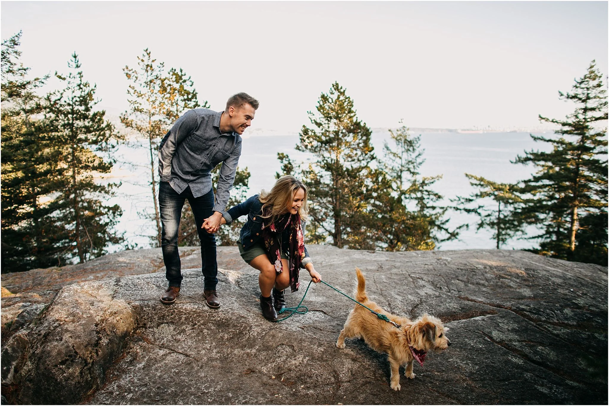 dog pulling owners on leash candid laughing