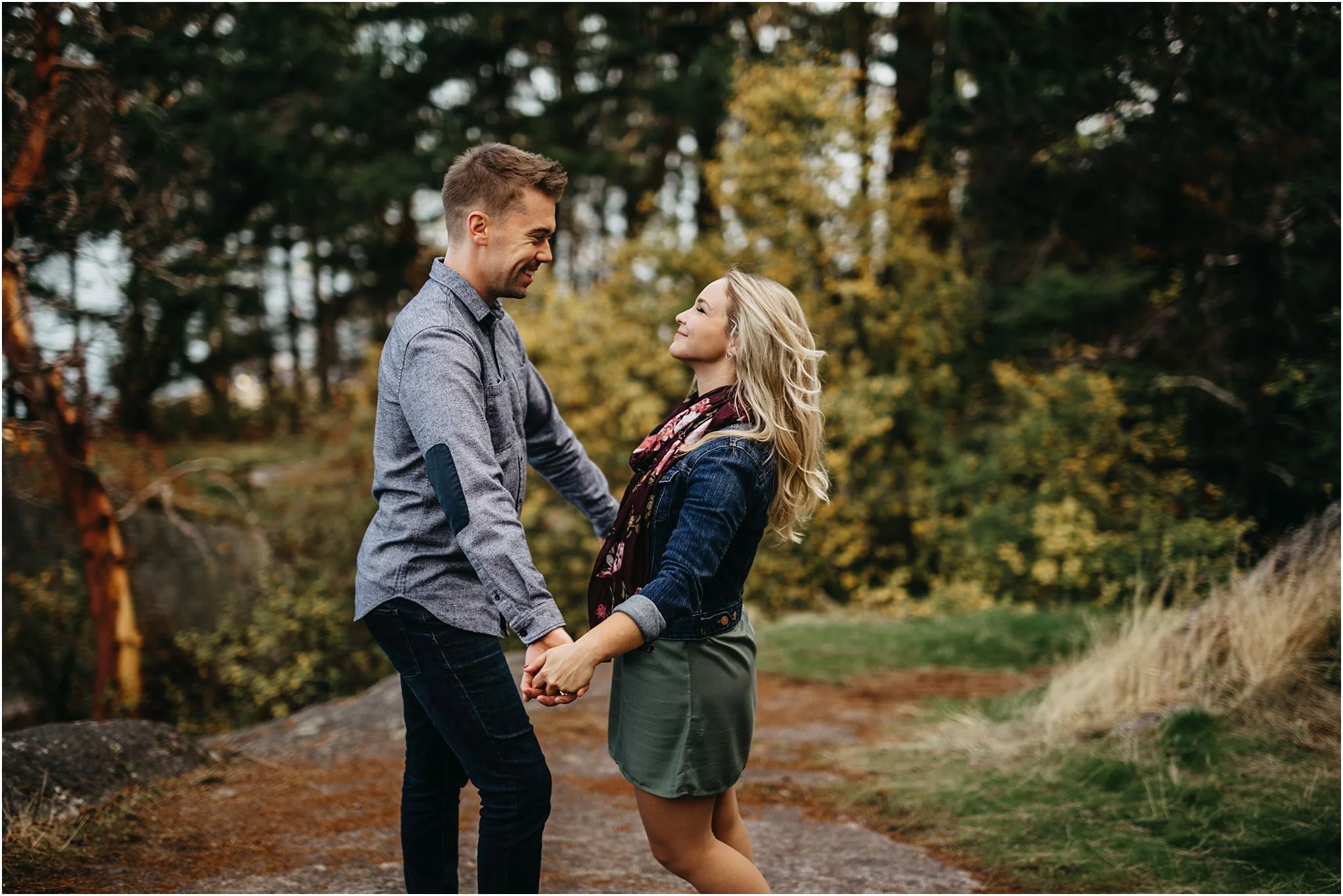 man and woman holding hands movement laughing