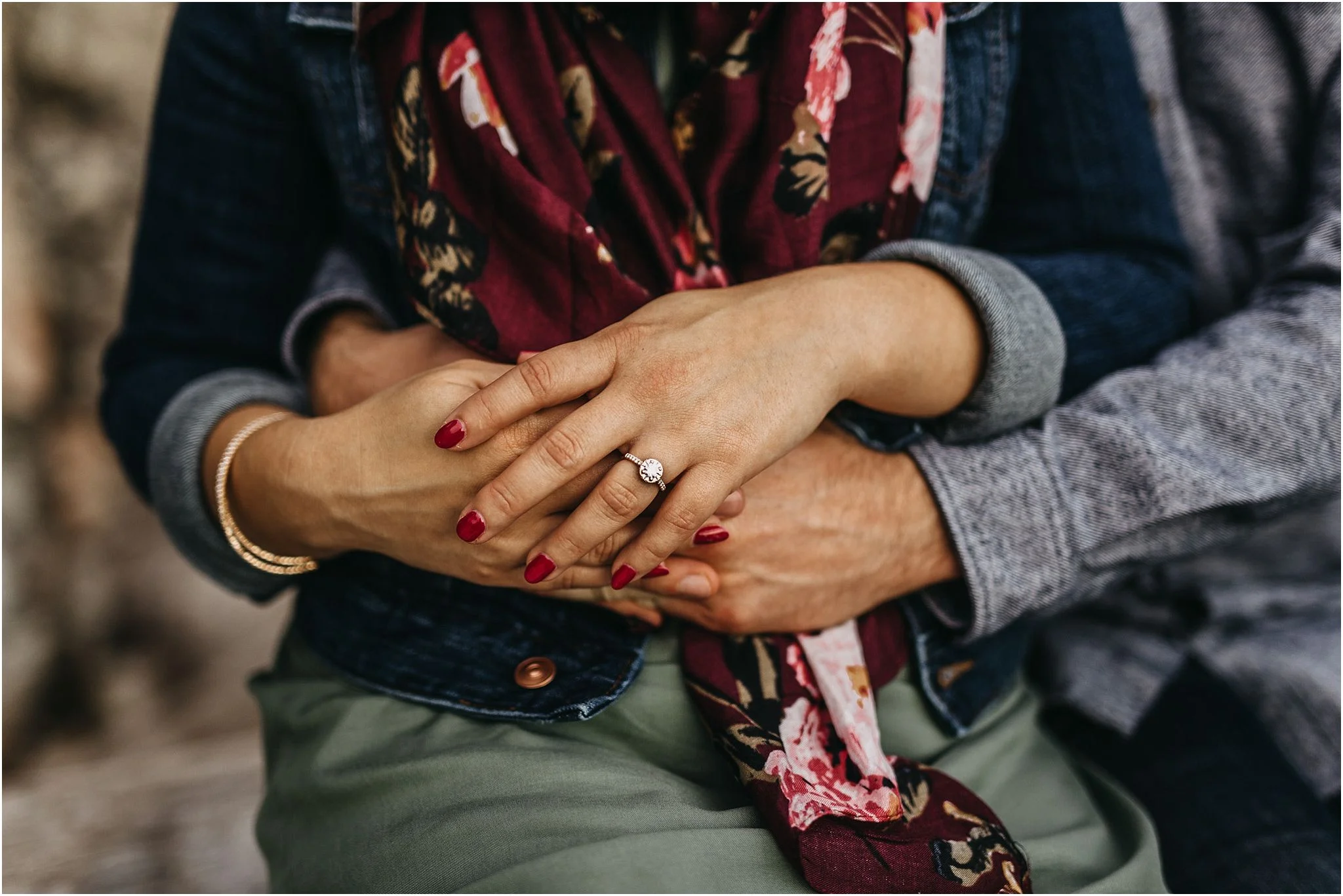 engagement ring holding hand close up