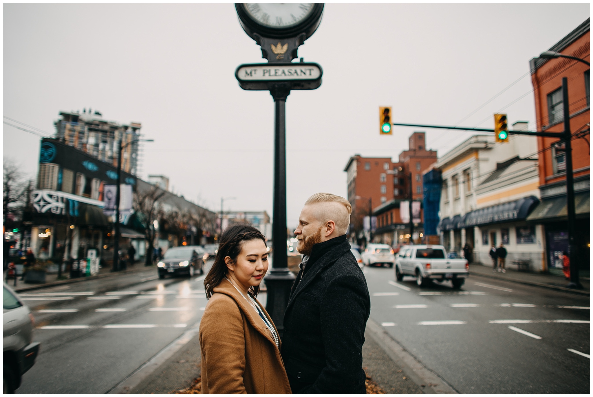 couple in front of mount pleasant clock vancouver city engagement