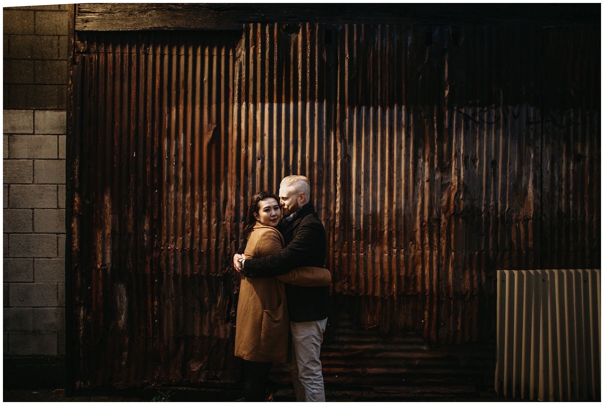 couple engagement metal rustic industrial city vancouver granville island
