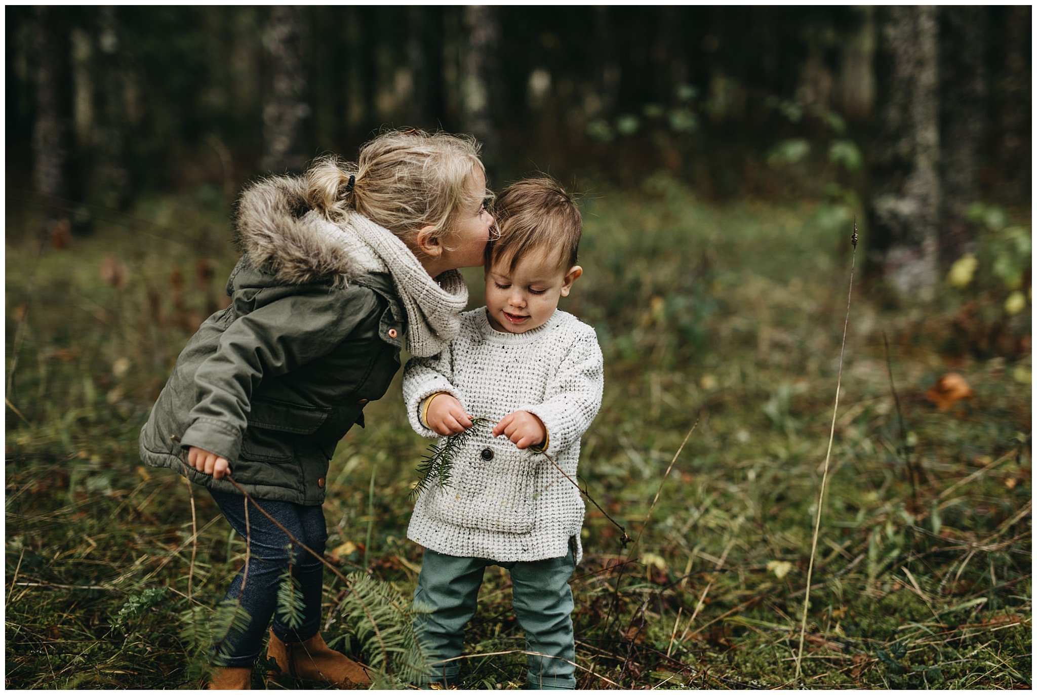 sister kissing brother cheek family photos chilliwack forest