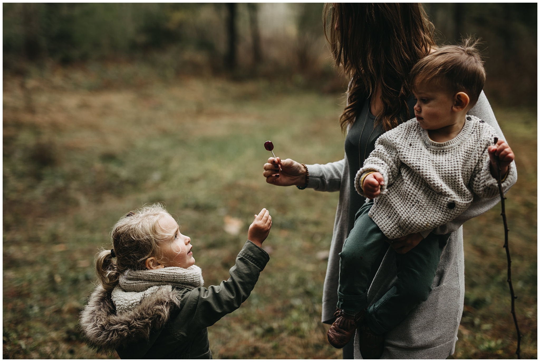 daughter sharing lollipop with mom family photos chilliwack journalism