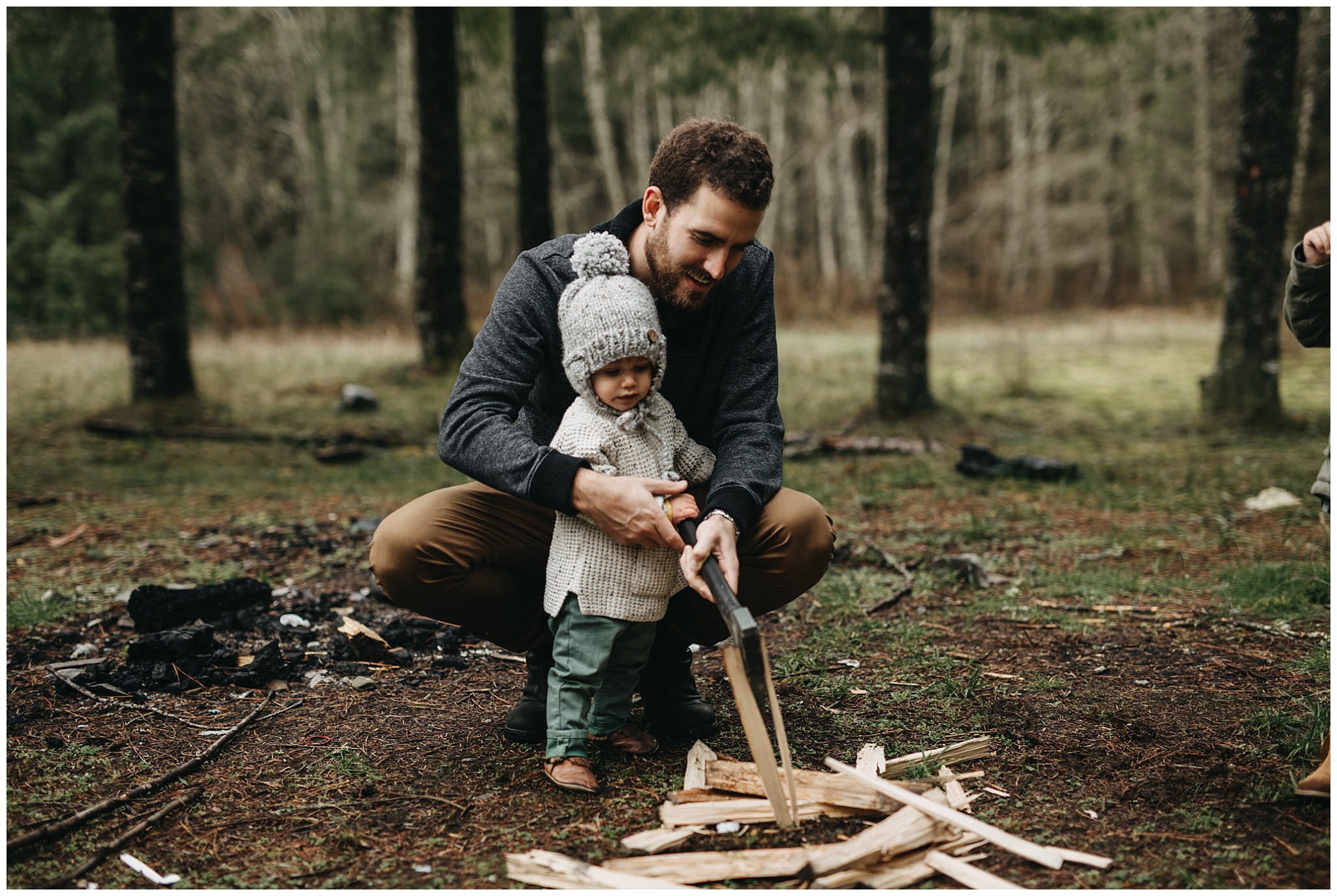 dad teaching son chop firewood camp fire chilliwack family photos