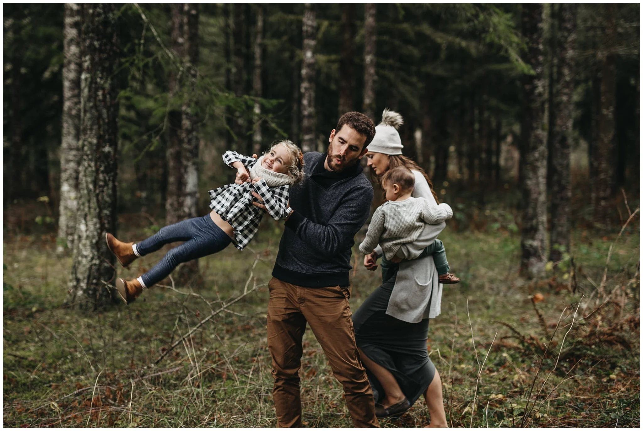 dad swinging daughter back and forth play chilliwack forest family photos