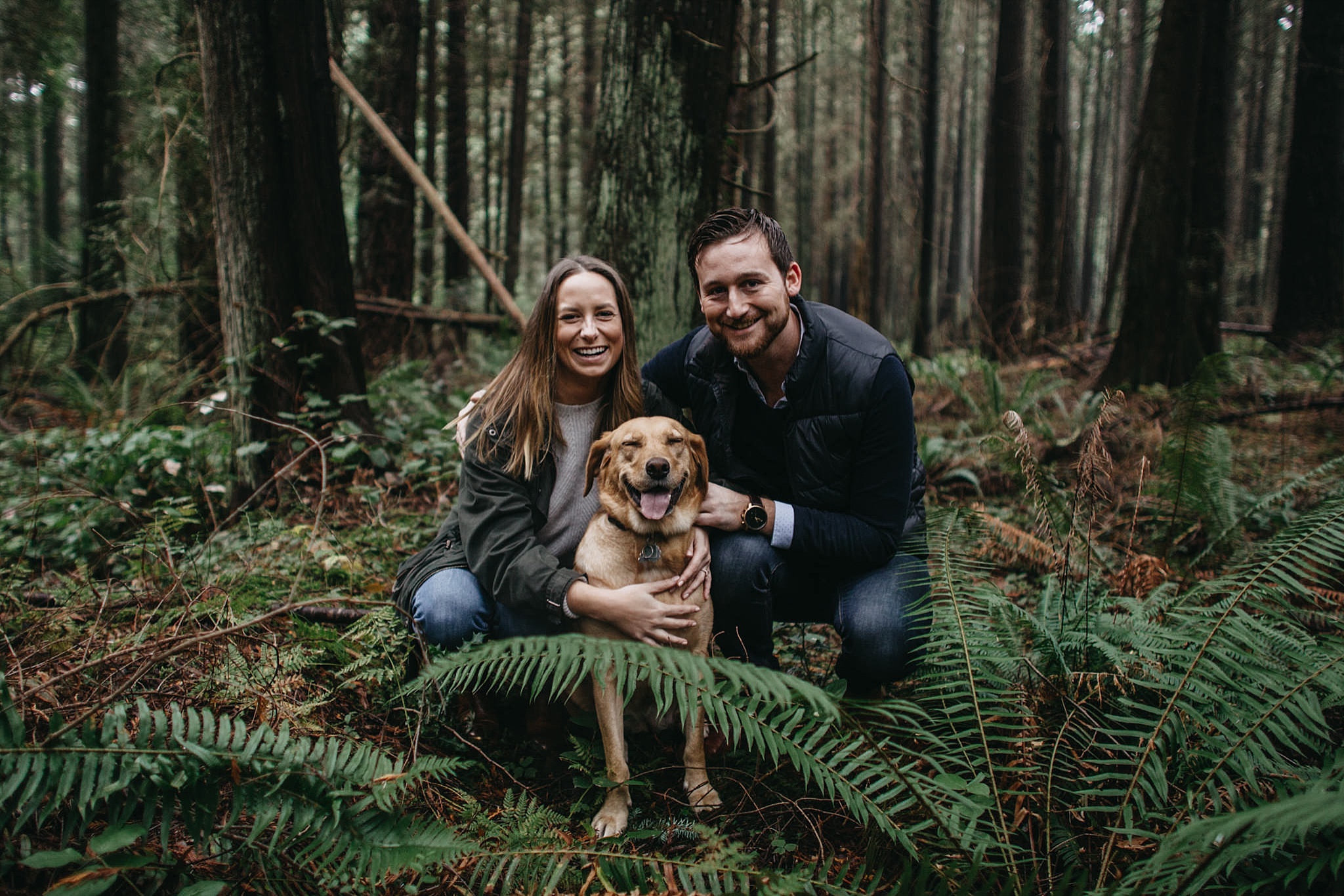 couple and dog engagement photos pacific spirit park forest