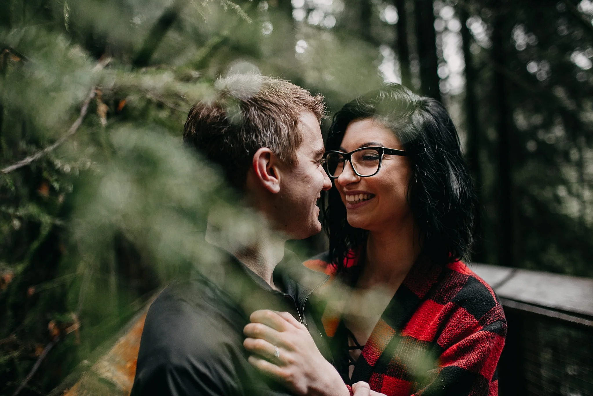 couple laughing trees forest capilano suspension bridge