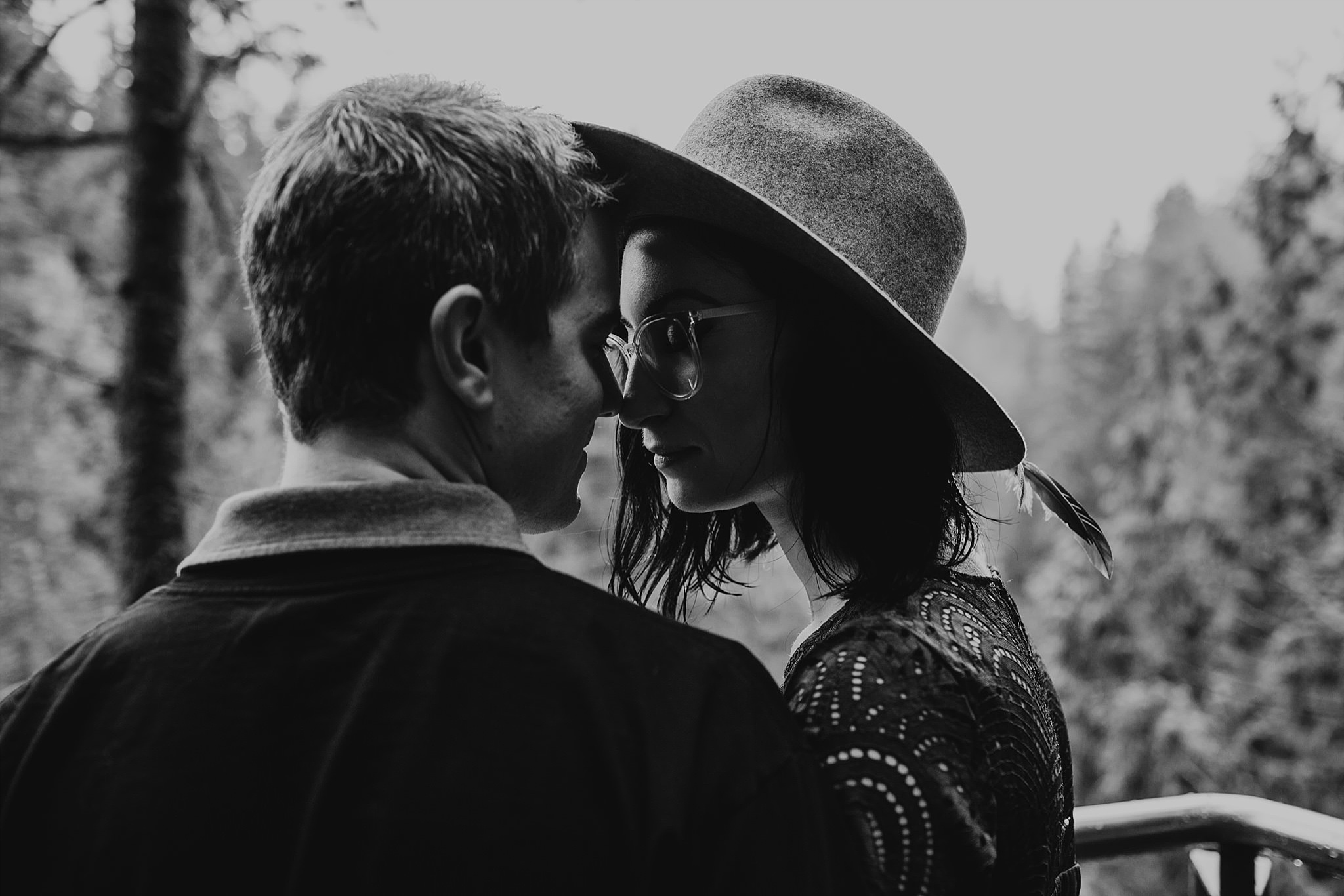 moody black and white couple at capilano suspension bridge engagement photos