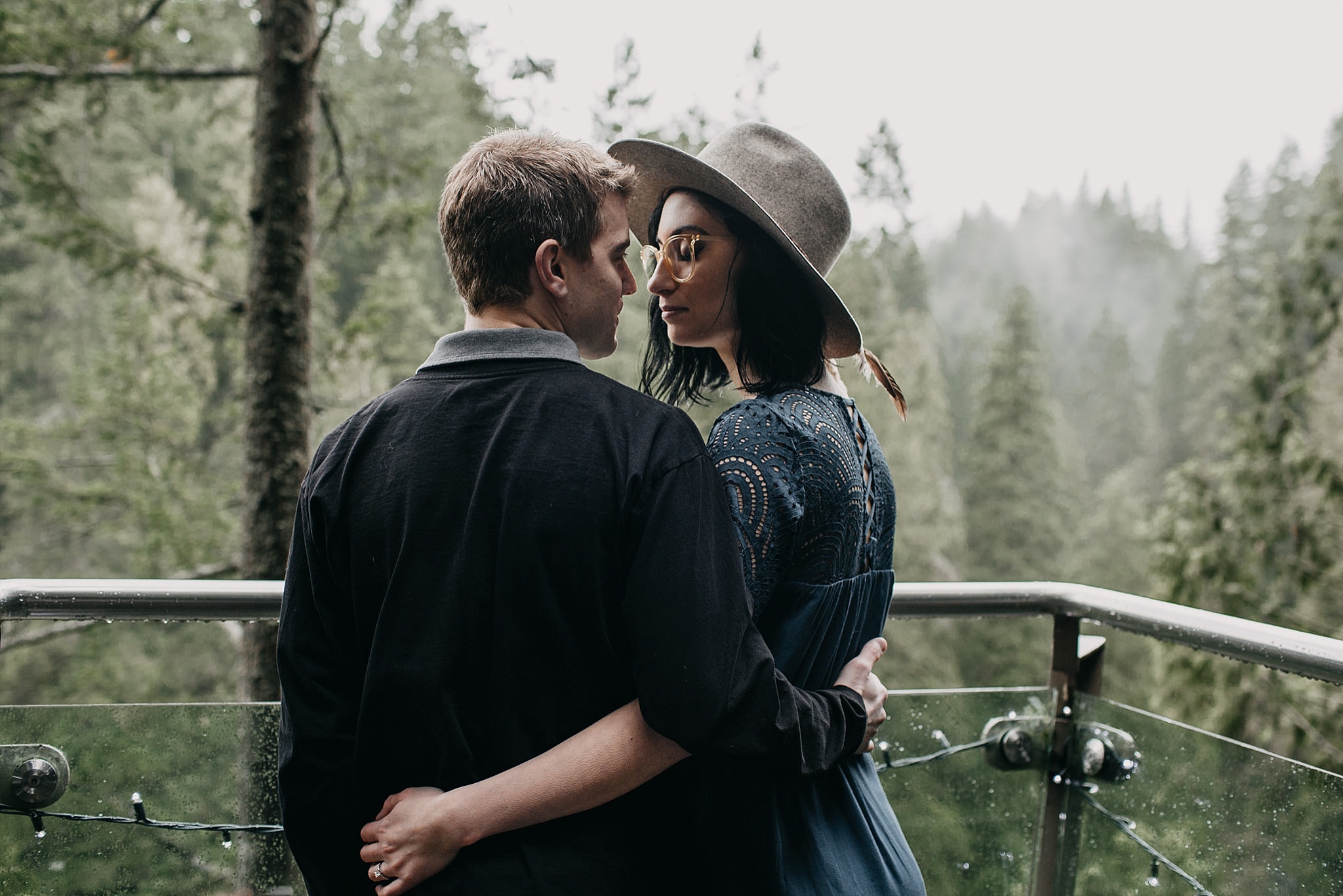 couple at lookout point capilano suspension bridge view engagement photos