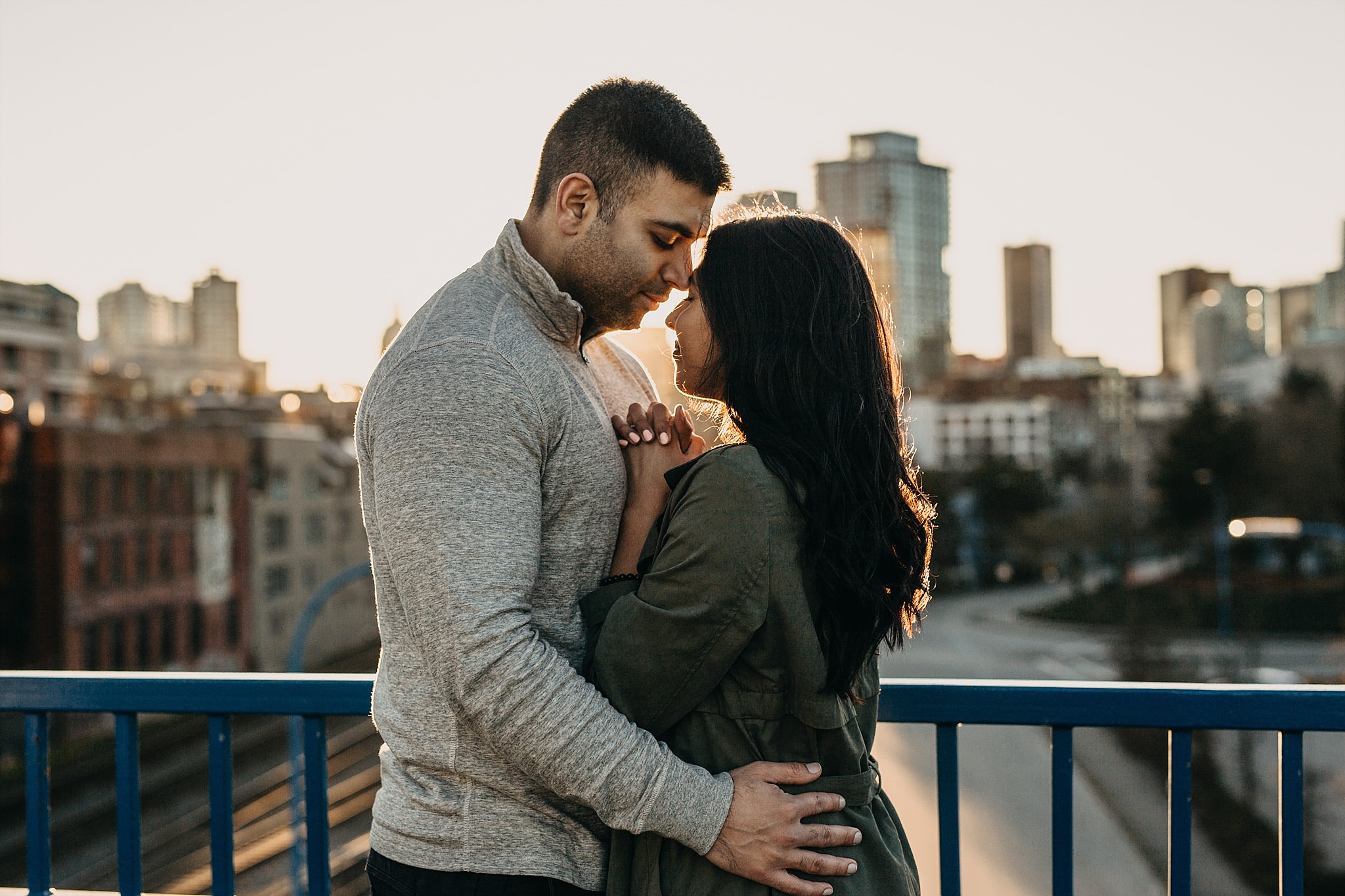 couple intimate romantic engagement session downtown vancouver sunset