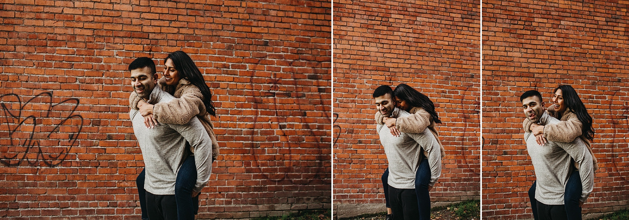 couple piggyback ride city brick wall downtown vancouver engagement