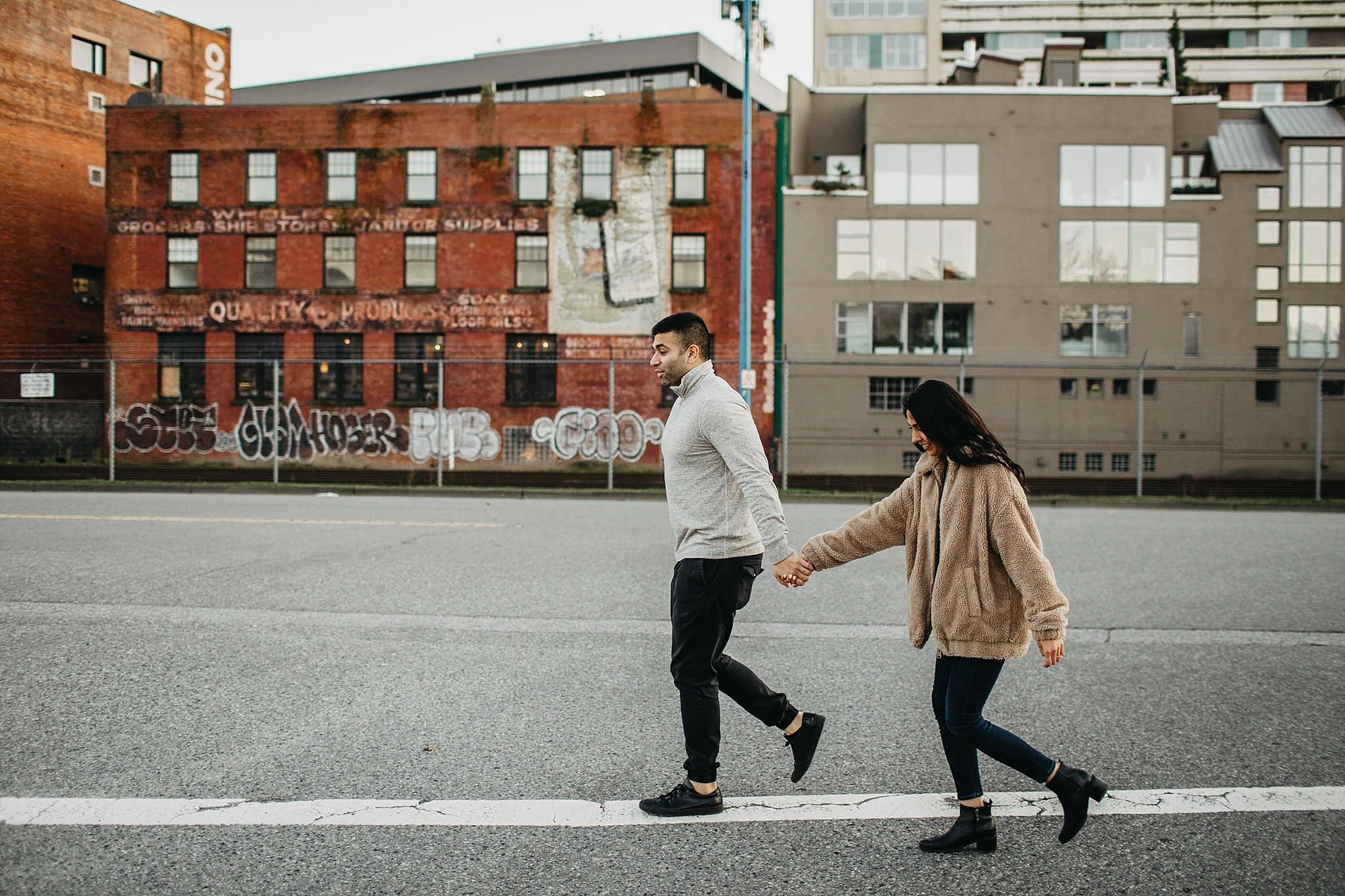 crab park engagement downtown vancouver sunset couple walking