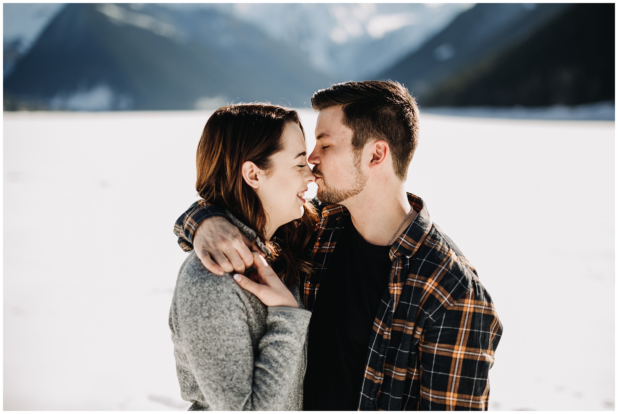 jones lake chilliwack engagement session snow mountains couple kiss on nose