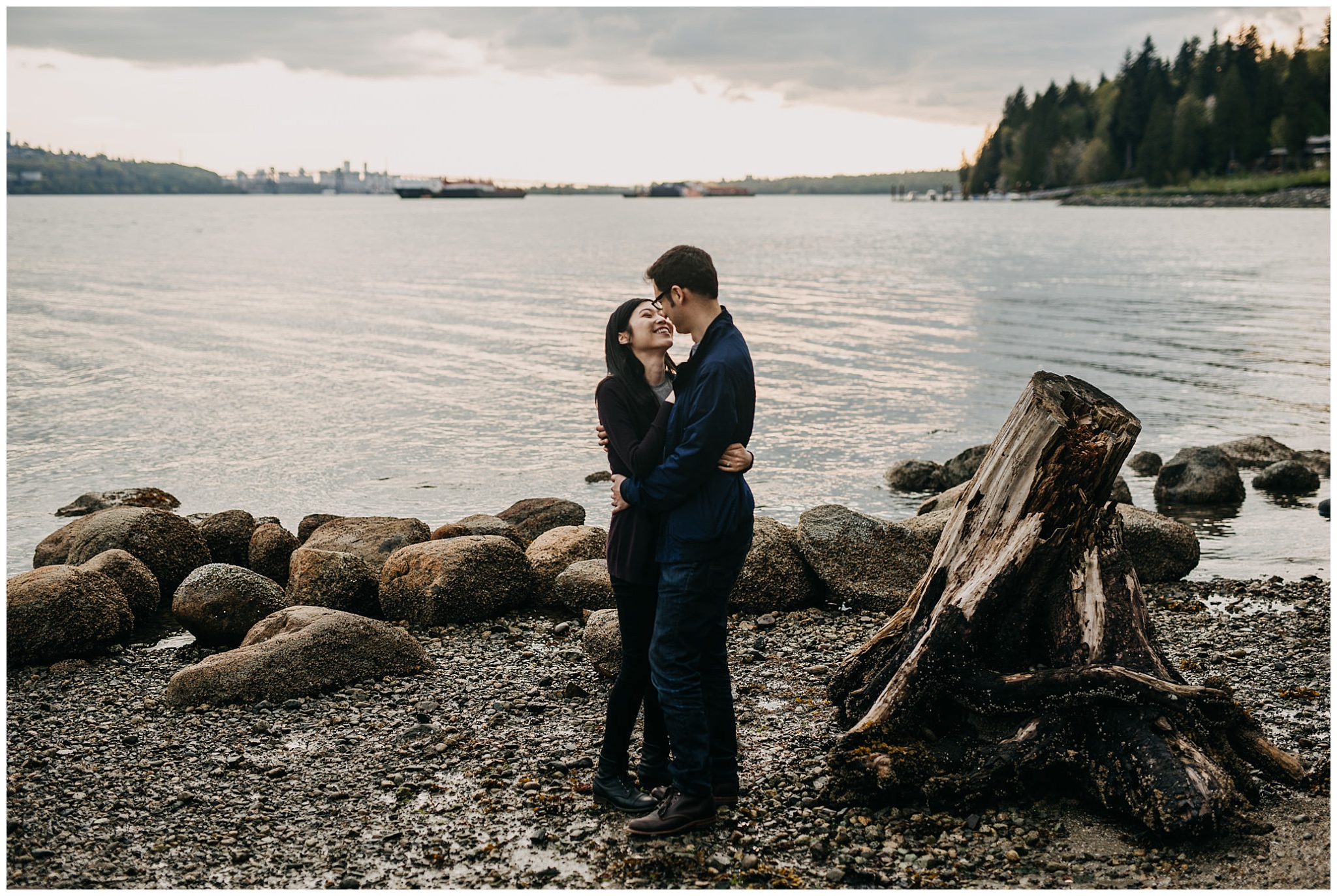 sunset north vancouver cates park engagement session couple kissing