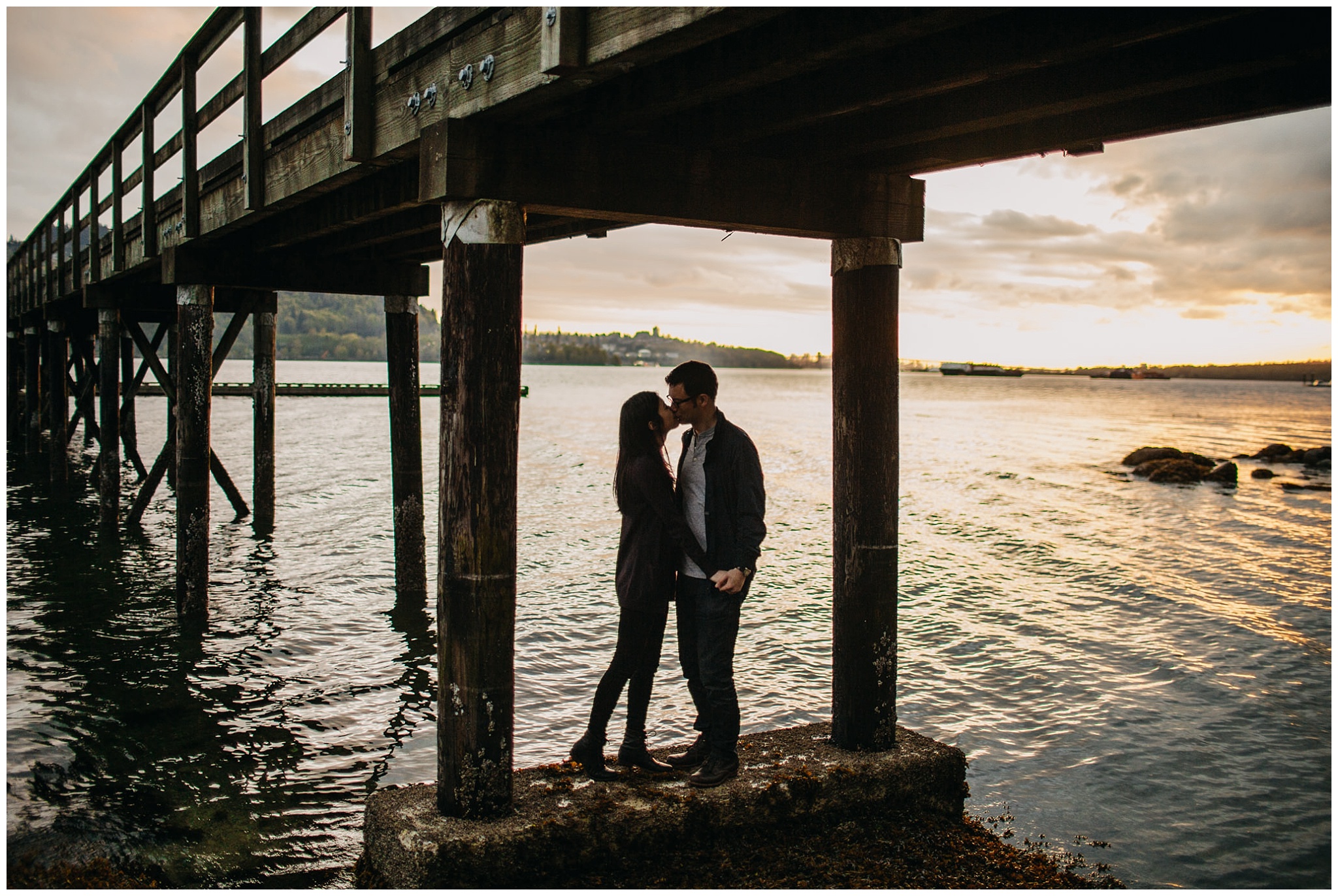 vancouver sunset engagement session beach couple silhouette