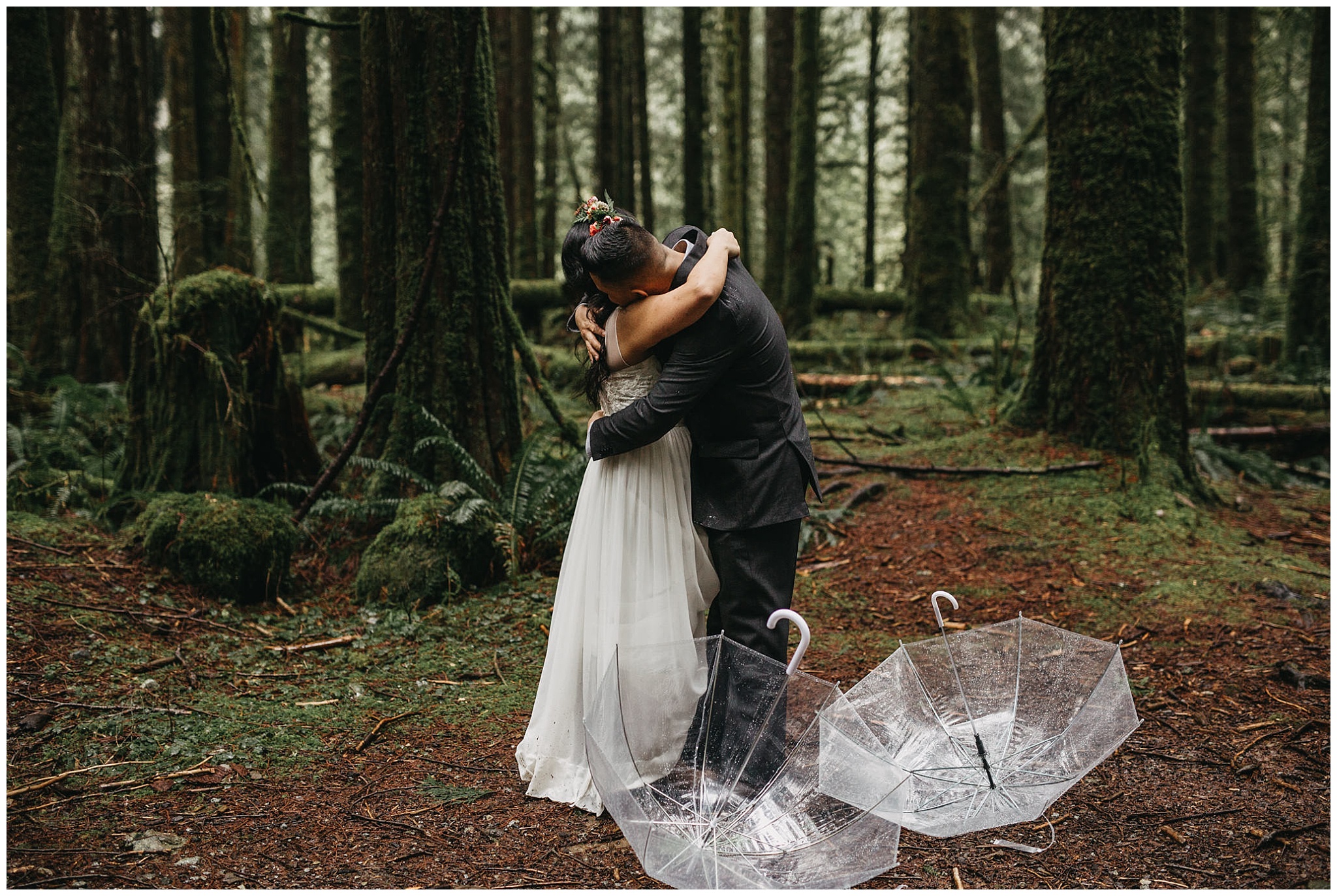 bride groom hug after first look rainy intimate forest wedding golden ears