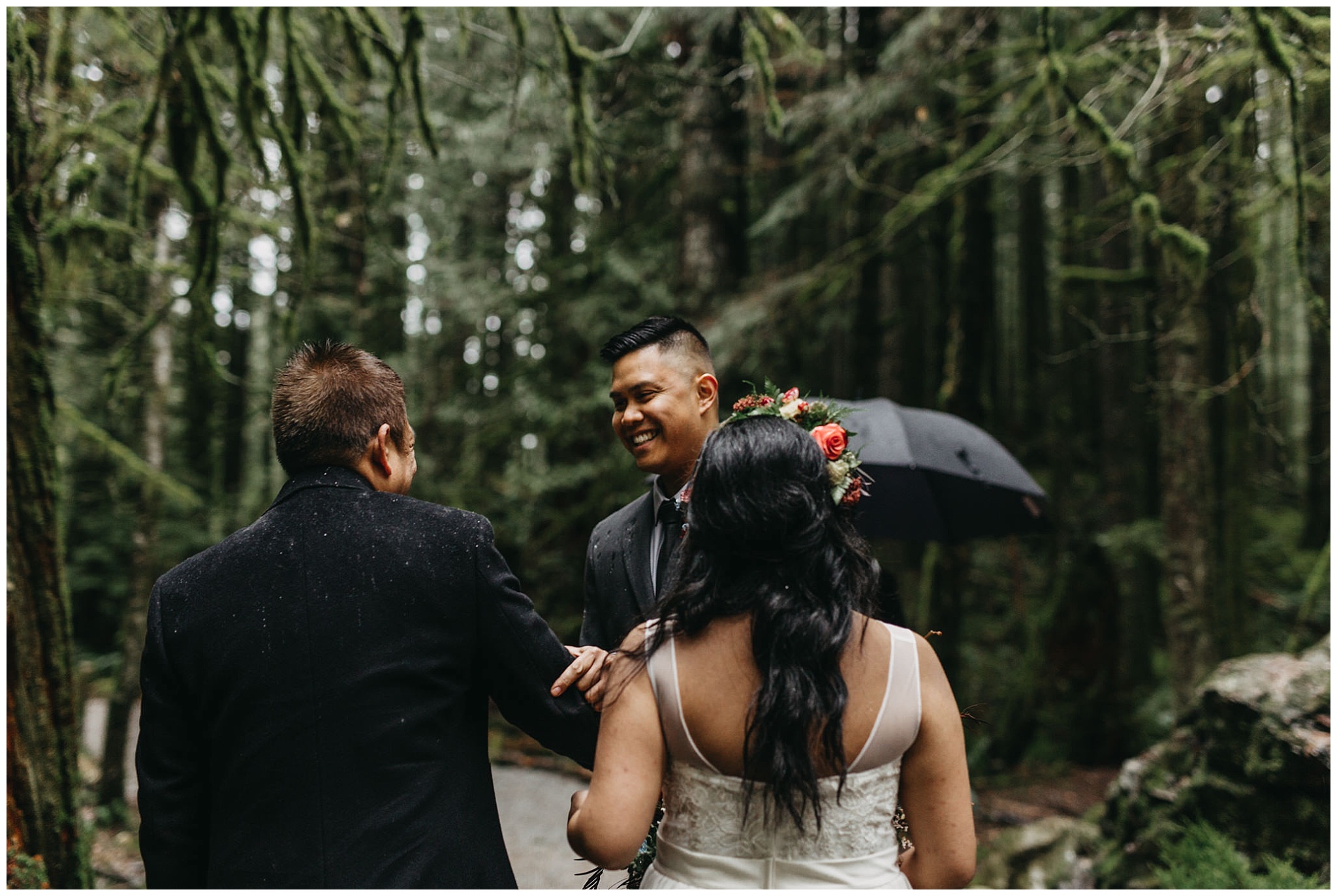 groom shaking father of bride's hand ceremony forest intimate golden ears wedding